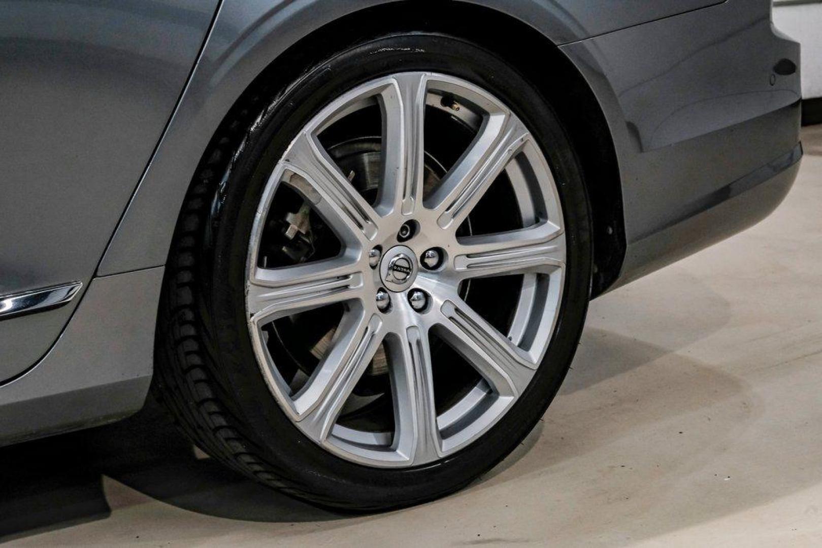 2017 Gray Metallic /Amber Volvo S90 T6 Inscription (YV1A22ML6H1) with an I4 Supercharged engine, Automatic transmission, located at 15300 Midway Rd., Addison, TX, 75001, (972) 702-0011, 32.958321, -96.838074 - HOME OF THE NO HAGGLE PRICE - WHOLESALE PRICES TO THE PUBLIC!! S90 T6 Inscription, 4D Sedan, I4 Supercharged, Automatic with Geartronic, AWD, Gray Metallic, Amber Leather. Priced below KBB Fair Purchase Price!<br><br>Gray Metallic 2017 Volvo S90 T6 Inscription<br><br>22/31 City/Highway MPG<br><br>Aw - Photo#71