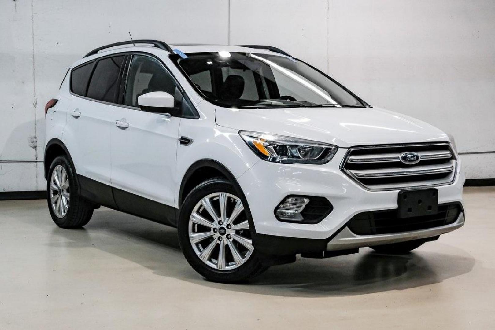 2019 Oxford White /Charcoal Black Ford Escape SEL (1FMCU9HD1KU) with an 1.5L EcoBoost engine, Automatic transmission, located at 15300 Midway Rd., Addison, TX, 75001, (972) 702-0011, 32.958321, -96.838074 - Photo#8