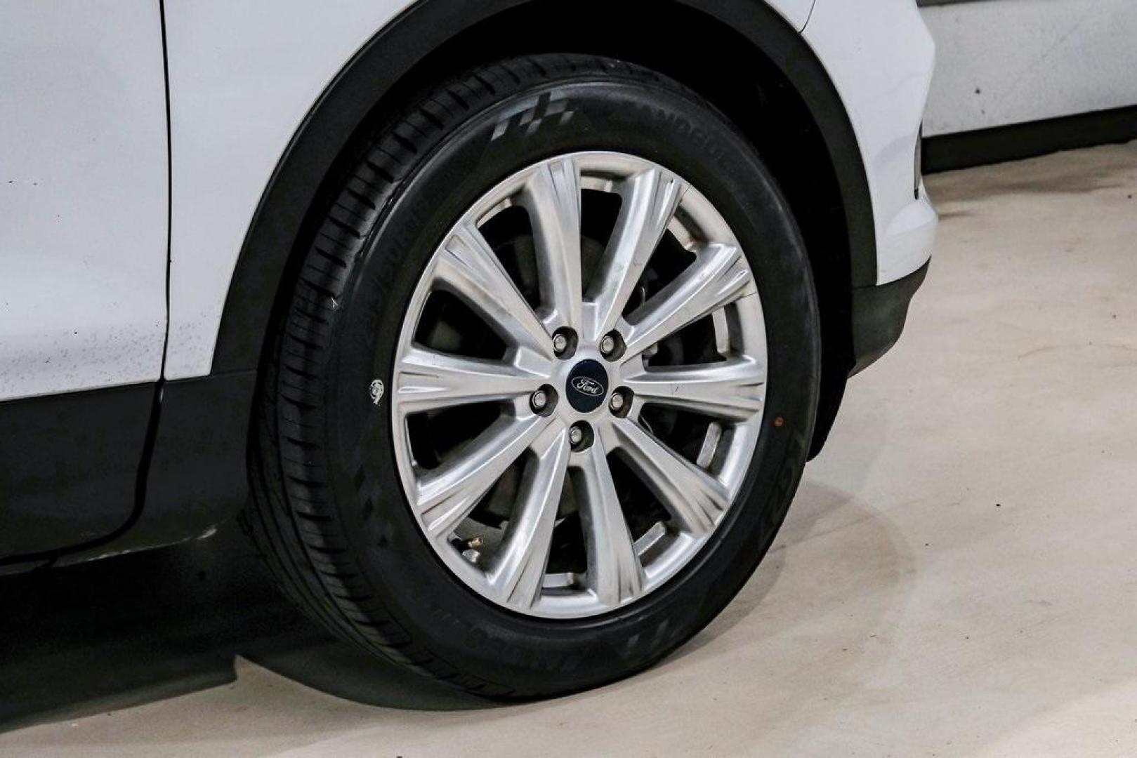 2019 Oxford White /Charcoal Black Ford Escape SEL (1FMCU9HD1KU) with an 1.5L EcoBoost engine, Automatic transmission, located at 15300 Midway Rd., Addison, TX, 75001, (972) 702-0011, 32.958321, -96.838074 - Photo#62