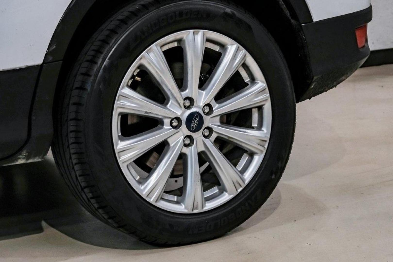 2019 Oxford White /Charcoal Black Ford Escape SEL (1FMCU9HD1KU) with an 1.5L EcoBoost engine, Automatic transmission, located at 15300 Midway Rd., Addison, TX, 75001, (972) 702-0011, 32.958321, -96.838074 - Photo#64