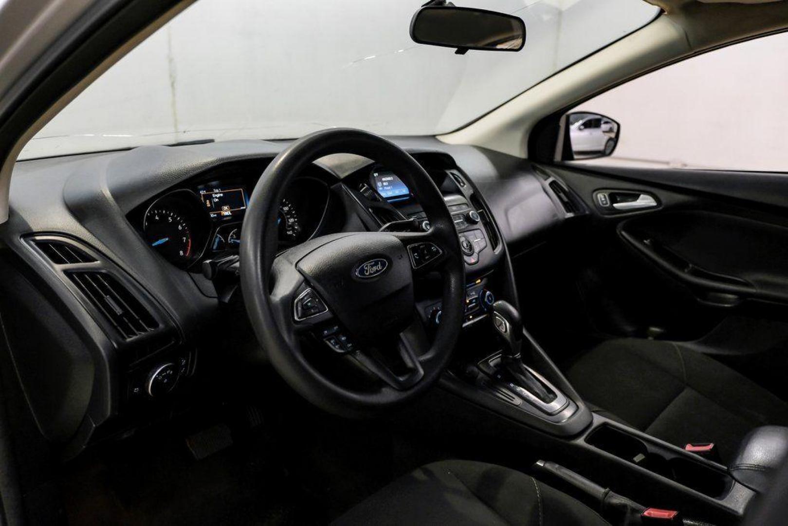 2018 Ingot Silver /Charcoal Black Ford Focus SE (1FADP3K28JL) with an 2.0L I4 DGI Ti-VCT engine, Automatic transmission, located at 15300 Midway Rd., Addison, TX, 75001, (972) 702-0011, 32.958321, -96.838074 - Photo#2