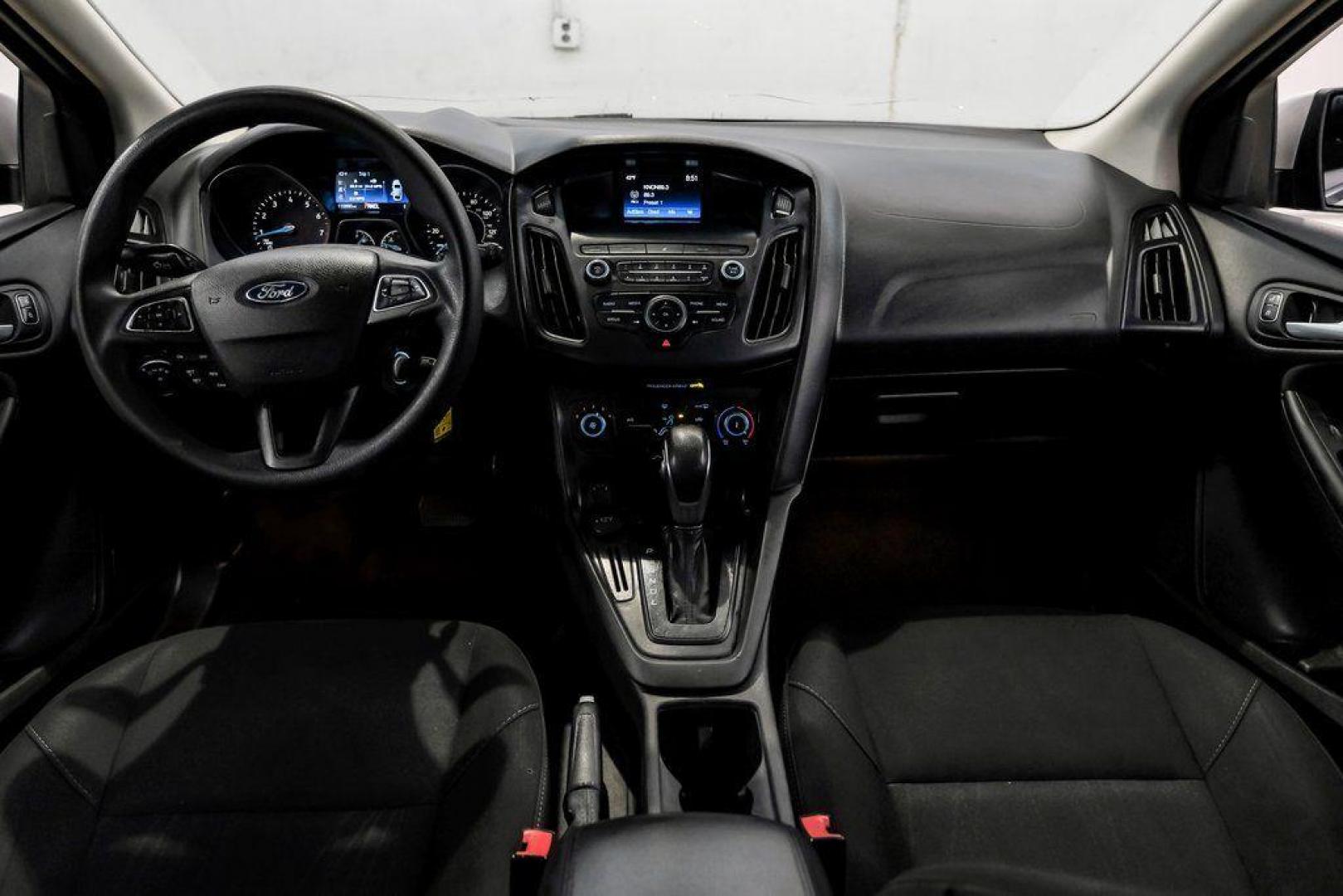 2018 Ingot Silver /Charcoal Black Ford Focus SE (1FADP3K28JL) with an 2.0L I4 DGI Ti-VCT engine, Automatic transmission, located at 15300 Midway Rd., Addison, TX, 75001, (972) 702-0011, 32.958321, -96.838074 - Photo#18