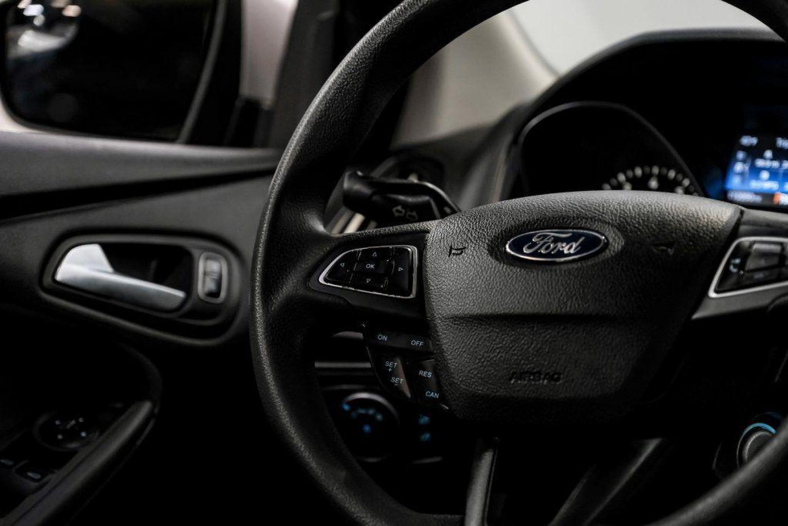 2018 Ingot Silver /Charcoal Black Ford Focus SE (1FADP3K28JL) with an 2.0L I4 DGI Ti-VCT engine, Automatic transmission, located at 15300 Midway Rd., Addison, TX, 75001, (972) 702-0011, 32.958321, -96.838074 - Photo#21