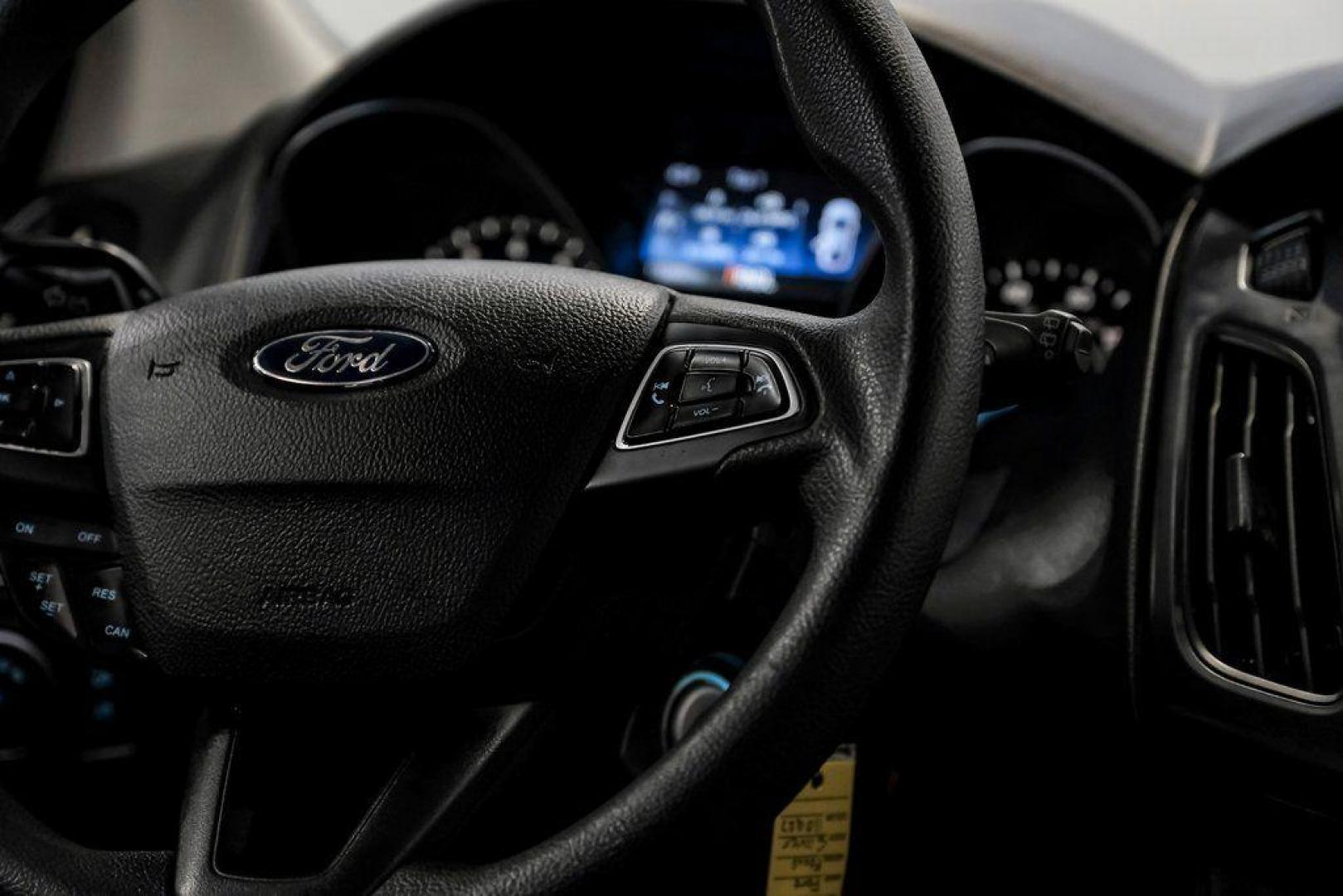 2018 Ingot Silver /Charcoal Black Ford Focus SE (1FADP3K28JL) with an 2.0L I4 DGI Ti-VCT engine, Automatic transmission, located at 15300 Midway Rd., Addison, TX, 75001, (972) 702-0011, 32.958321, -96.838074 - Photo#22