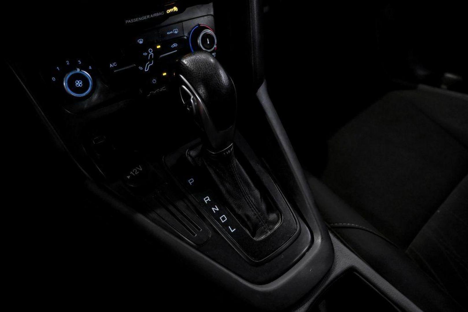 2018 Ingot Silver /Charcoal Black Ford Focus SE (1FADP3K28JL) with an 2.0L I4 DGI Ti-VCT engine, Automatic transmission, located at 15300 Midway Rd., Addison, TX, 75001, (972) 702-0011, 32.958321, -96.838074 - Photo#27