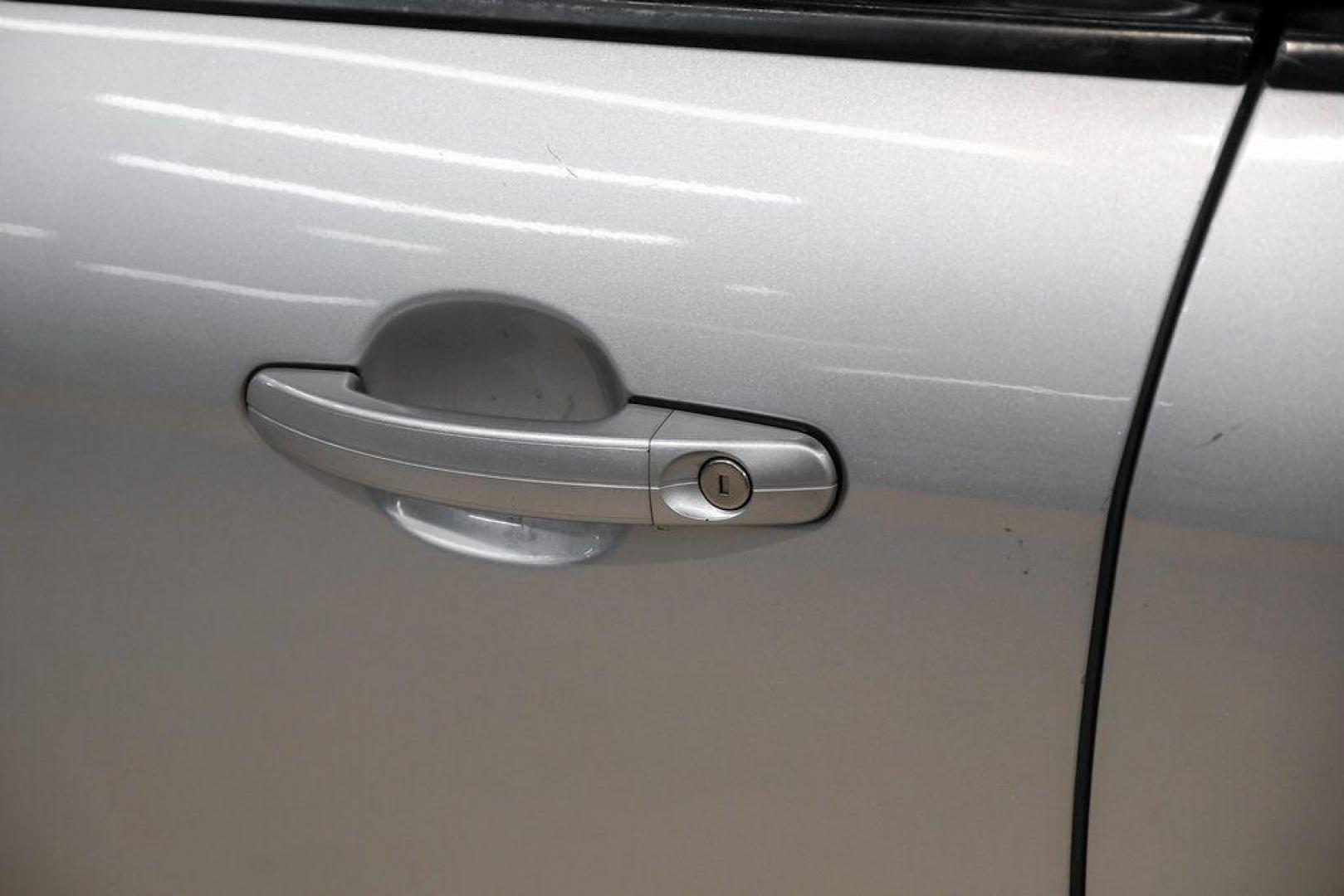 2018 Ingot Silver /Charcoal Black Ford Focus SE (1FADP3K28JL) with an 2.0L I4 DGI Ti-VCT engine, Automatic transmission, located at 15300 Midway Rd., Addison, TX, 75001, (972) 702-0011, 32.958321, -96.838074 - Photo#42