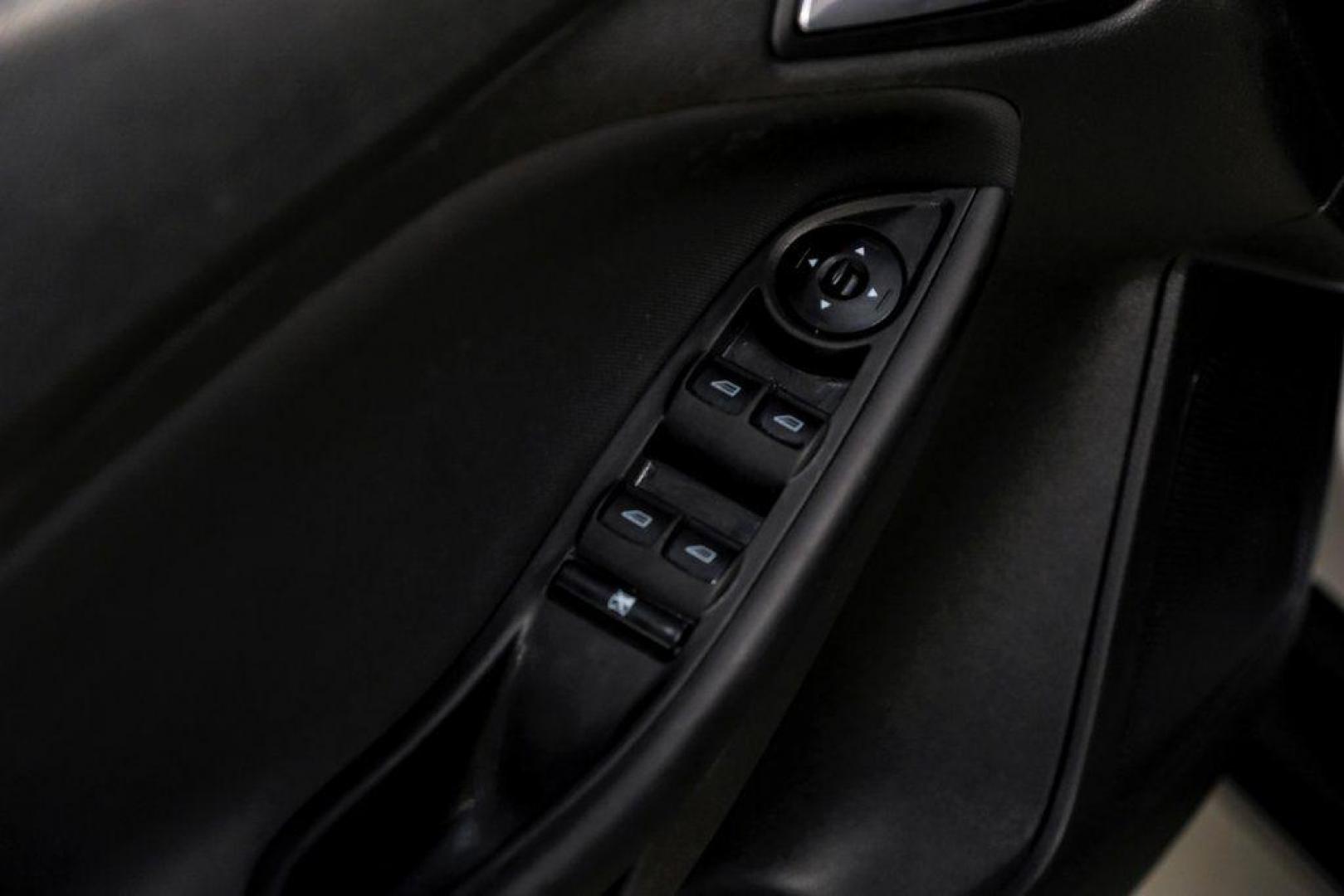 2018 Ingot Silver /Charcoal Black Ford Focus SE (1FADP3K28JL) with an 2.0L I4 DGI Ti-VCT engine, Automatic transmission, located at 15300 Midway Rd., Addison, TX, 75001, (972) 702-0011, 32.958321, -96.838074 - Photo#44