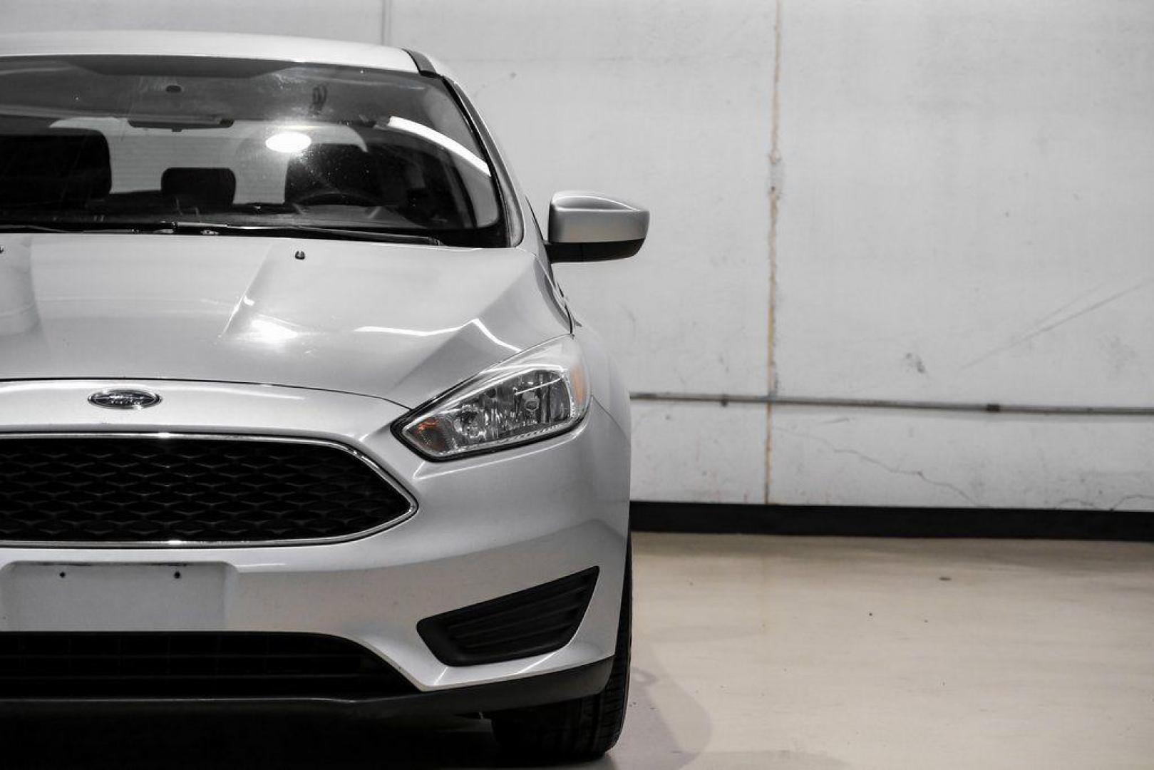 2018 Ingot Silver /Charcoal Black Ford Focus SE (1FADP3K28JL) with an 2.0L I4 DGI Ti-VCT engine, Automatic transmission, located at 15300 Midway Rd., Addison, TX, 75001, (972) 702-0011, 32.958321, -96.838074 - Photo#48