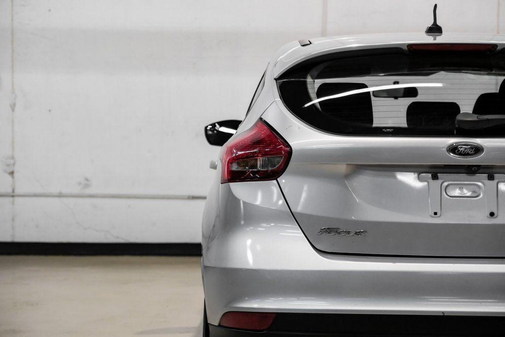 2018 Ingot Silver /Charcoal Black Ford Focus SE (1FADP3K28JL) with an 2.0L I4 DGI Ti-VCT engine, Automatic transmission, located at 15300 Midway Rd., Addison, TX, 75001, (972) 702-0011, 32.958321, -96.838074 - Photo#49