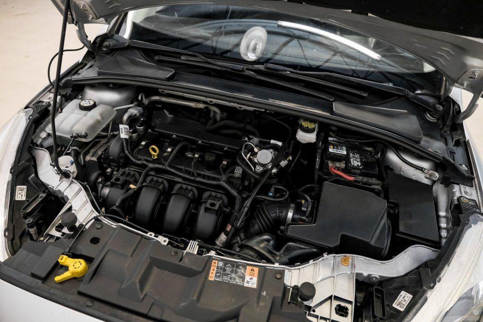 2018 Ingot Silver /Charcoal Black Ford Focus SE (1FADP3K28JL) with an 2.0L I4 DGI Ti-VCT engine, Automatic transmission, located at 15300 Midway Rd., Addison, TX, 75001, (972) 702-0011, 32.958321, -96.838074 - Photo#50