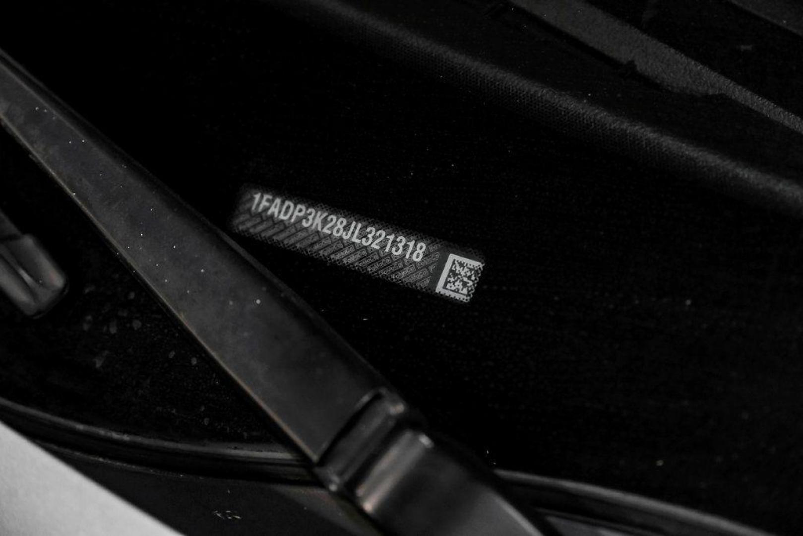 2018 Ingot Silver /Charcoal Black Ford Focus SE (1FADP3K28JL) with an 2.0L I4 DGI Ti-VCT engine, Automatic transmission, located at 15300 Midway Rd., Addison, TX, 75001, (972) 702-0011, 32.958321, -96.838074 - Photo#58