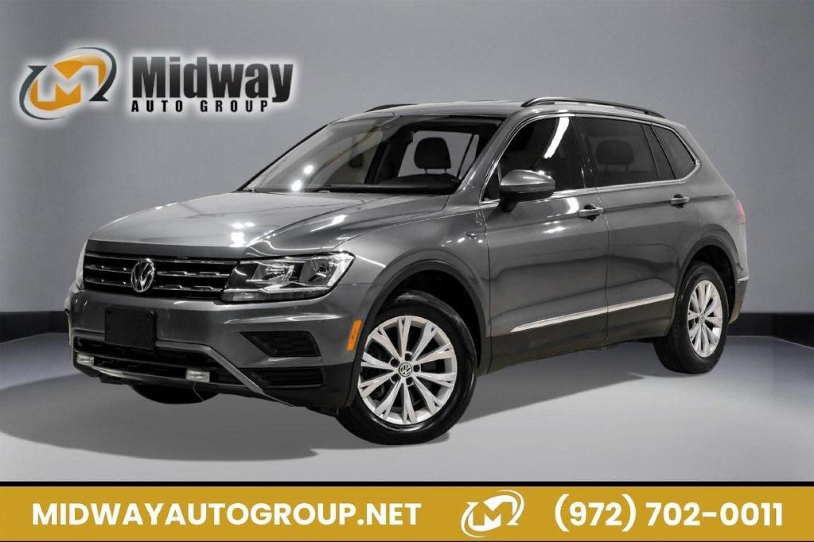 2018 Platinum Gray Metallic /White Volkswagen Tiguan 2.0T SEL (3VV3B7AX4JM) with an 2.0L TSI DOHC engine, Automatic transmission, located at 15300 Midway Rd., Addison, TX, 75001, (972) 702-0011, 32.958321, -96.838074 - Photo#0
