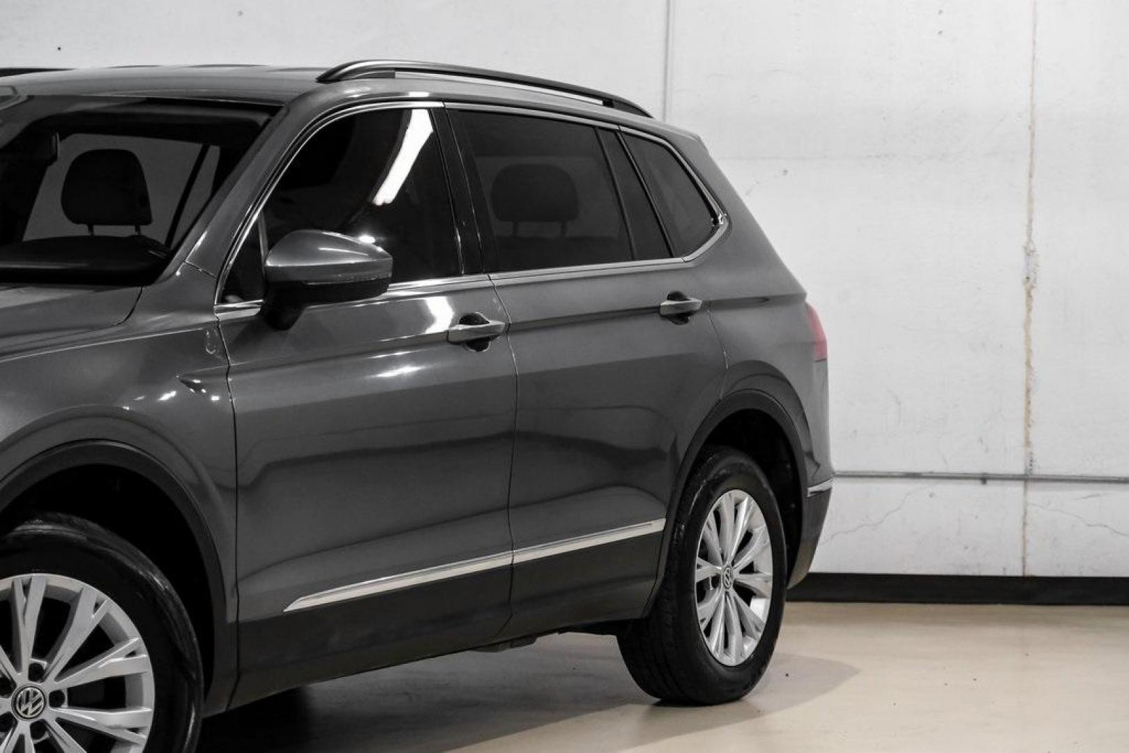 2018 Platinum Gray Metallic /White Volkswagen Tiguan 2.0T SEL (3VV3B7AX4JM) with an 2.0L TSI DOHC engine, Automatic transmission, located at 15300 Midway Rd., Addison, TX, 75001, (972) 702-0011, 32.958321, -96.838074 - Photo#5