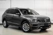 2018 Platinum Gray Metallic /White Volkswagen Tiguan 2.0T SEL (3VV3B7AX4JM) with an 2.0L TSI DOHC engine, Automatic transmission, located at 15300 Midway Rd., Addison, TX, 75001, (972) 702-0011, 32.958321, -96.838074 - Photo#7
