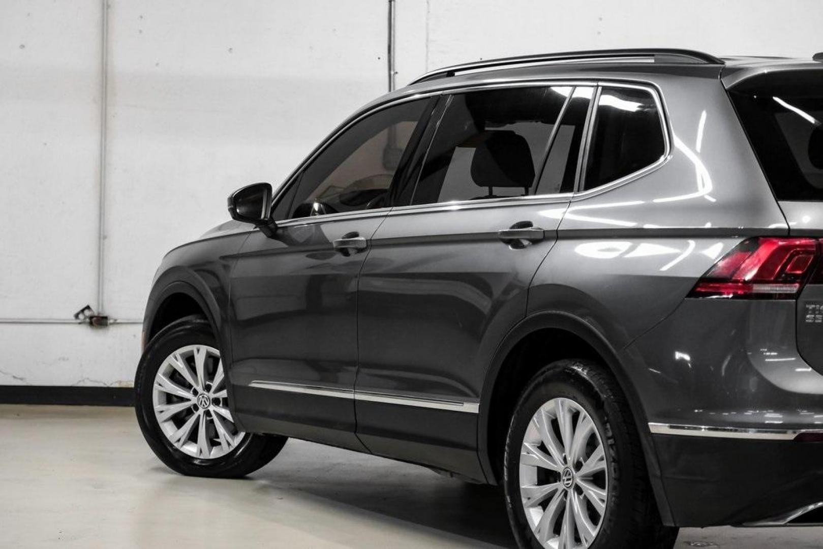 2018 Platinum Gray Metallic /White Volkswagen Tiguan 2.0T SEL (3VV3B7AX4JM) with an 2.0L TSI DOHC engine, Automatic transmission, located at 15300 Midway Rd., Addison, TX, 75001, (972) 702-0011, 32.958321, -96.838074 - Photo#12