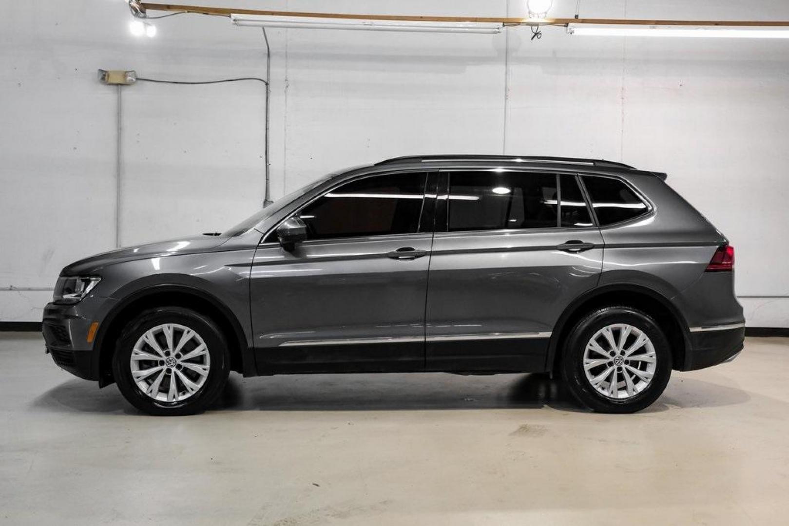 2018 Platinum Gray Metallic /White Volkswagen Tiguan 2.0T SEL (3VV3B7AX4JM) with an 2.0L TSI DOHC engine, Automatic transmission, located at 15300 Midway Rd., Addison, TX, 75001, (972) 702-0011, 32.958321, -96.838074 - Photo#14