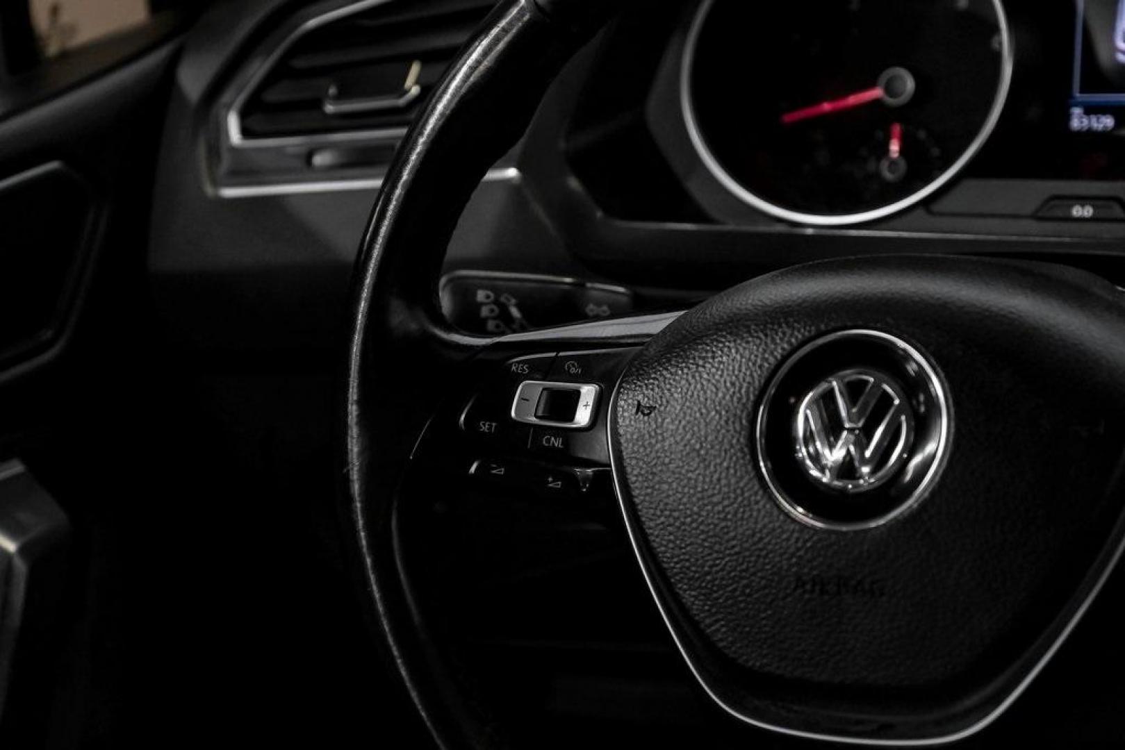 2018 Platinum Gray Metallic /White Volkswagen Tiguan 2.0T SEL (3VV3B7AX4JM) with an 2.0L TSI DOHC engine, Automatic transmission, located at 15300 Midway Rd., Addison, TX, 75001, (972) 702-0011, 32.958321, -96.838074 - Photo#21