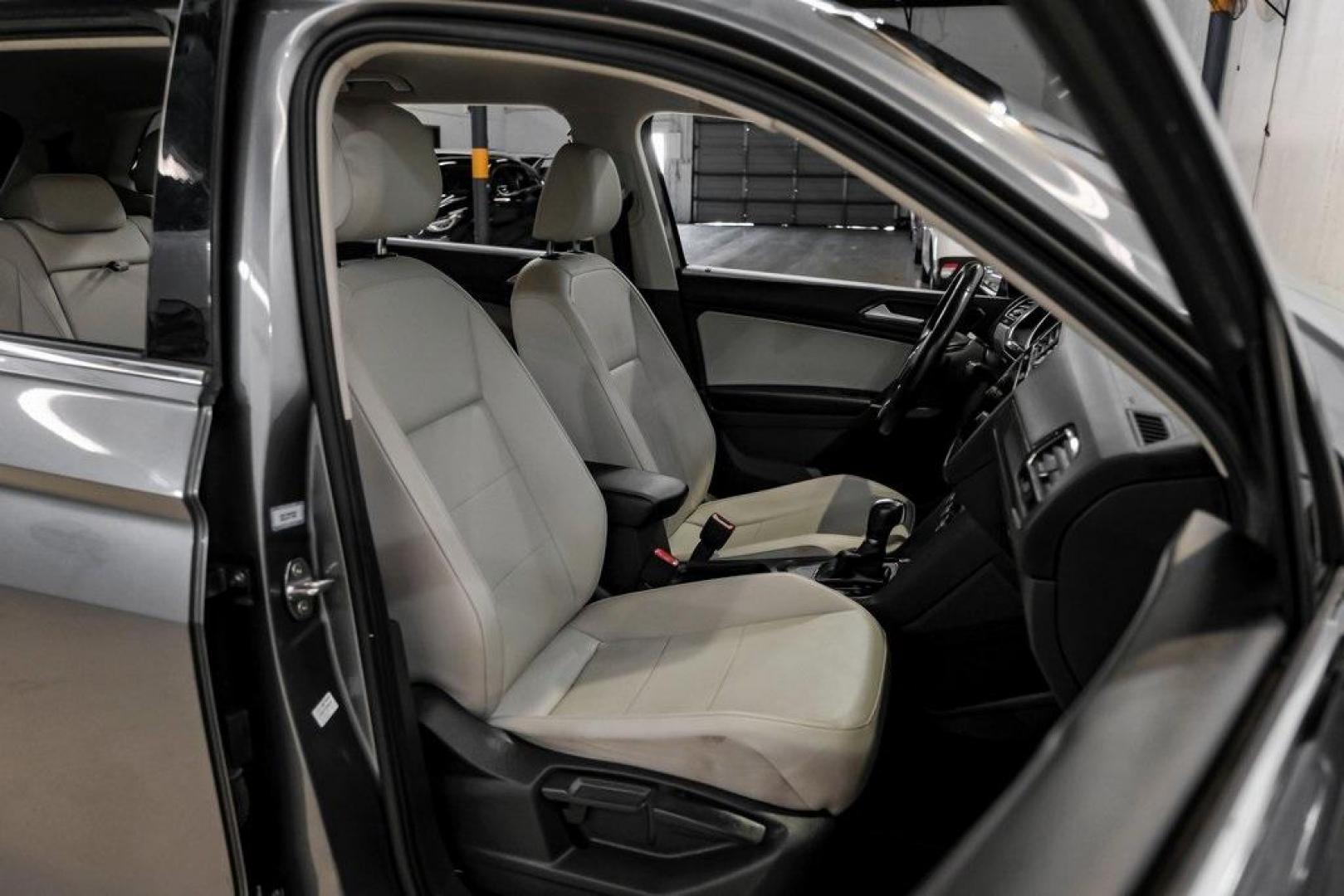 2018 Platinum Gray Metallic /White Volkswagen Tiguan 2.0T SEL (3VV3B7AX4JM) with an 2.0L TSI DOHC engine, Automatic transmission, located at 15300 Midway Rd., Addison, TX, 75001, (972) 702-0011, 32.958321, -96.838074 - Photo#34