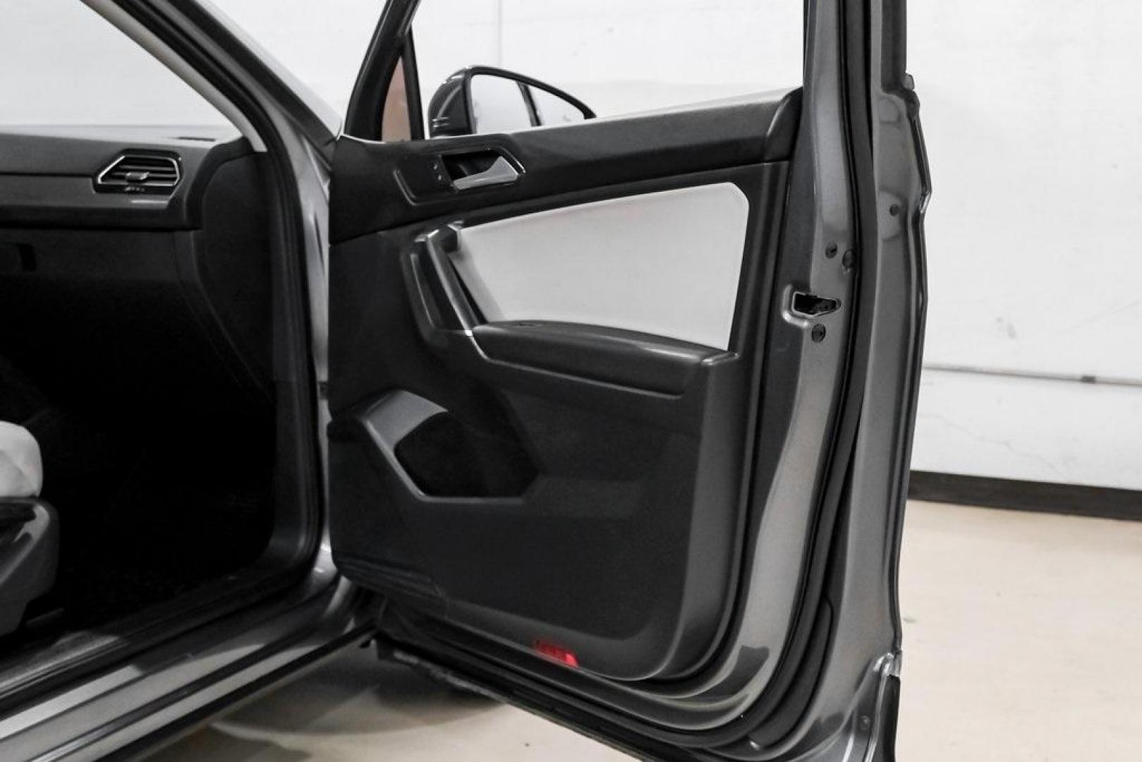 2018 Platinum Gray Metallic /White Volkswagen Tiguan 2.0T SEL (3VV3B7AX4JM) with an 2.0L TSI DOHC engine, Automatic transmission, located at 15300 Midway Rd., Addison, TX, 75001, (972) 702-0011, 32.958321, -96.838074 - Photo#45