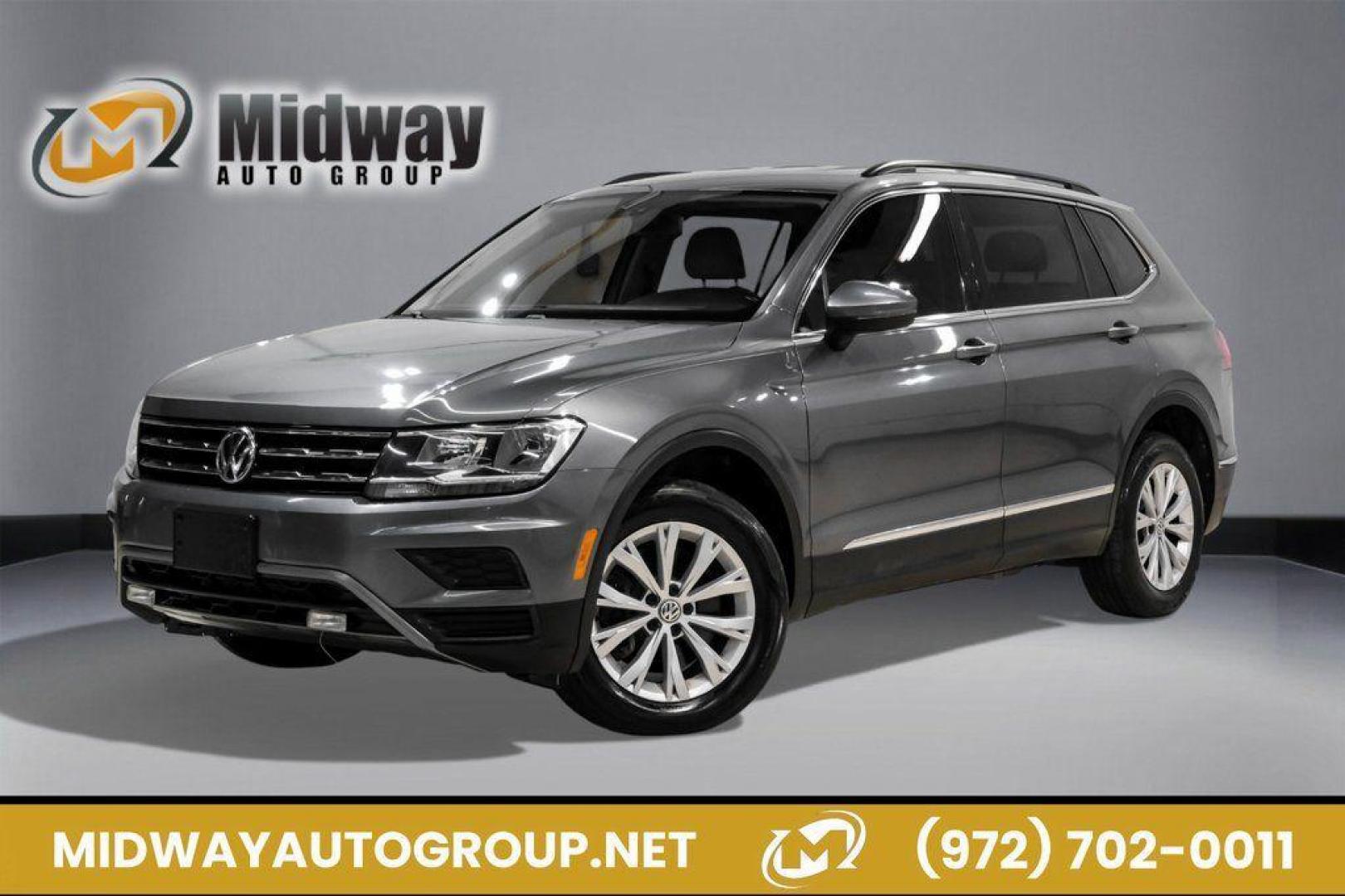 2018 Platinum Gray Metallic /White Volkswagen Tiguan 2.0T SEL (3VV3B7AX4JM) with an 2.0L TSI DOHC engine, Automatic transmission, located at 15300 Midway Rd., Addison, TX, 75001, (972) 702-0011, 32.958321, -96.838074 - Photo#0
