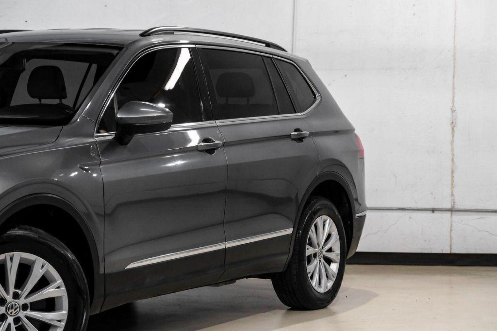 2018 Platinum Gray Metallic /White Volkswagen Tiguan 2.0T SEL (3VV3B7AX4JM) with an 2.0L TSI DOHC engine, Automatic transmission, located at 15300 Midway Rd., Addison, TX, 75001, (972) 702-0011, 32.958321, -96.838074 - Photo#5