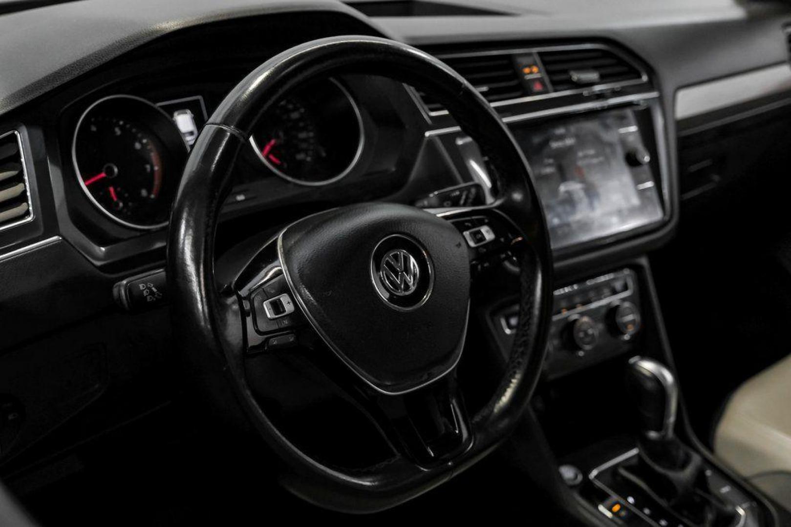 2018 Platinum Gray Metallic /White Volkswagen Tiguan 2.0T SEL (3VV3B7AX4JM) with an 2.0L TSI DOHC engine, Automatic transmission, located at 15300 Midway Rd., Addison, TX, 75001, (972) 702-0011, 32.958321, -96.838074 - Photo#20