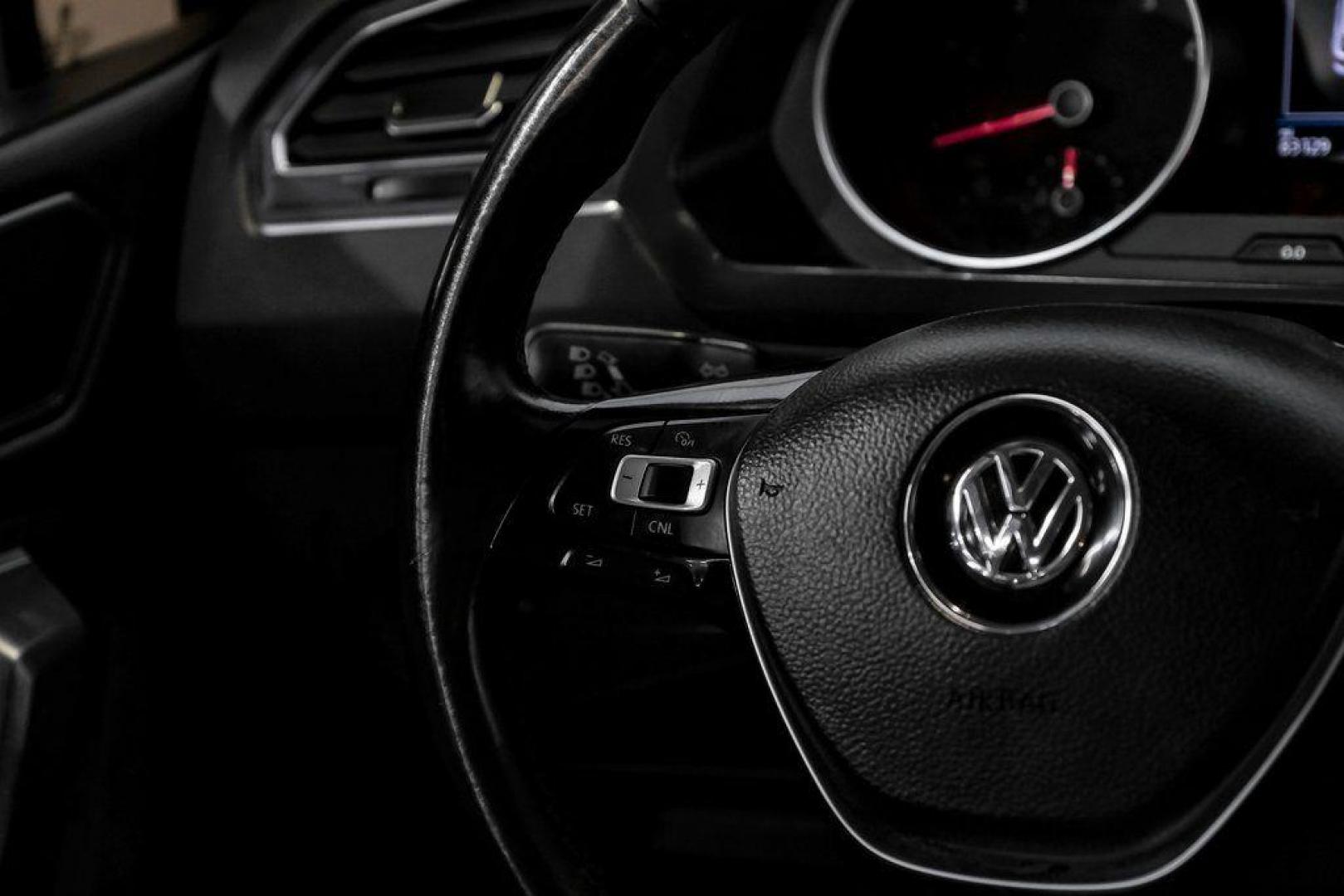 2018 Platinum Gray Metallic /White Volkswagen Tiguan 2.0T SEL (3VV3B7AX4JM) with an 2.0L TSI DOHC engine, Automatic transmission, located at 15300 Midway Rd., Addison, TX, 75001, (972) 702-0011, 32.958321, -96.838074 - Photo#21