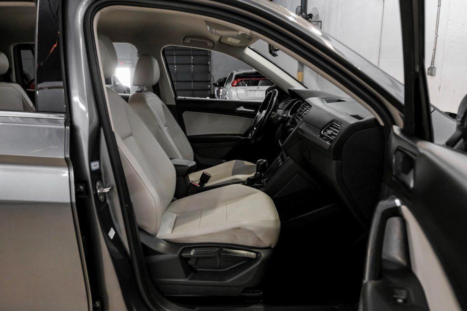 2018 Platinum Gray Metallic /White Volkswagen Tiguan 2.0T SEL (3VV3B7AX4JM) with an 2.0L TSI DOHC engine, Automatic transmission, located at 15300 Midway Rd., Addison, TX, 75001, (972) 702-0011, 32.958321, -96.838074 - Photo#33