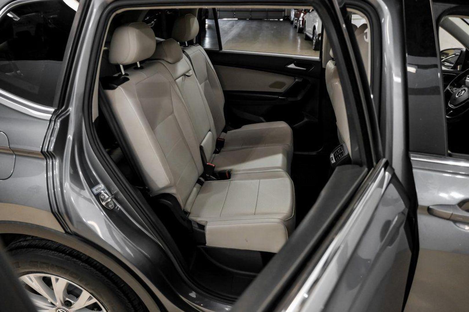 2018 Platinum Gray Metallic /White Volkswagen Tiguan 2.0T SEL (3VV3B7AX4JM) with an 2.0L TSI DOHC engine, Automatic transmission, located at 15300 Midway Rd., Addison, TX, 75001, (972) 702-0011, 32.958321, -96.838074 - Photo#35