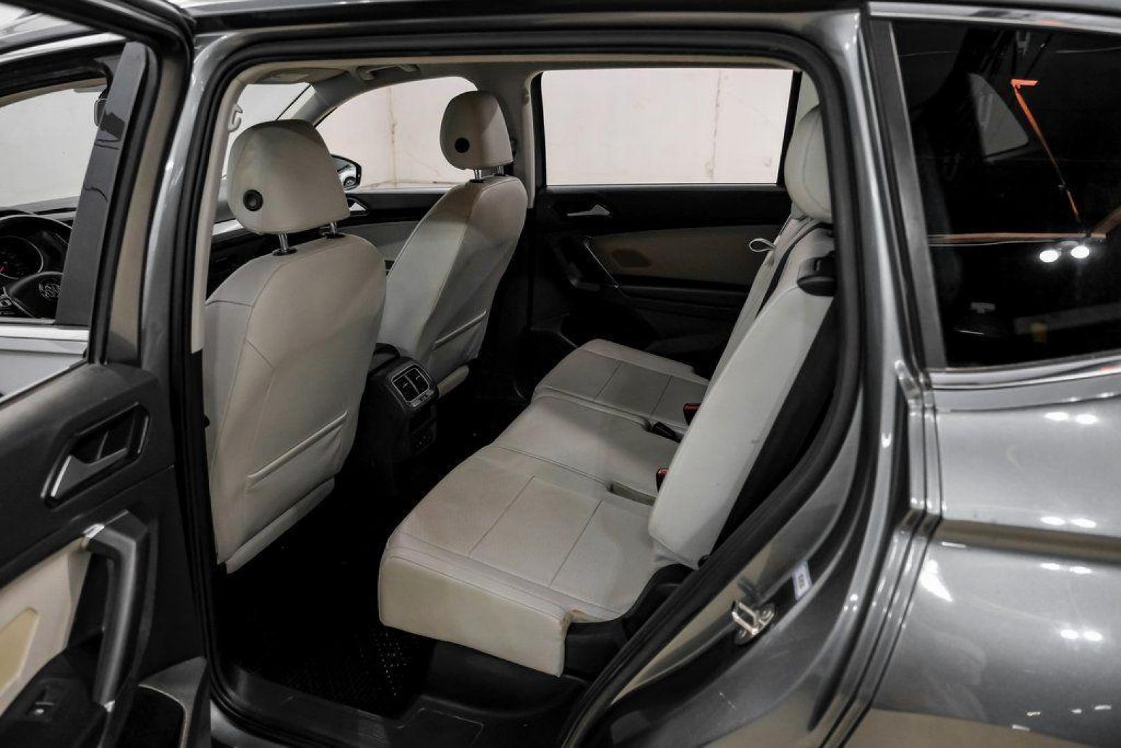 2018 Platinum Gray Metallic /White Volkswagen Tiguan 2.0T SEL (3VV3B7AX4JM) with an 2.0L TSI DOHC engine, Automatic transmission, located at 15300 Midway Rd., Addison, TX, 75001, (972) 702-0011, 32.958321, -96.838074 - Photo#37