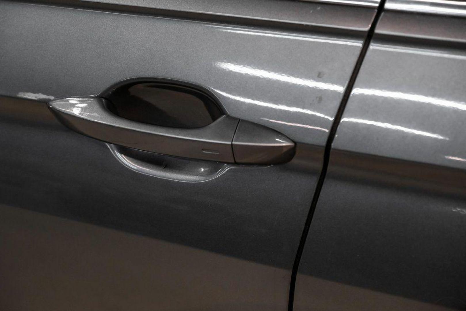 2018 Platinum Gray Metallic /White Volkswagen Tiguan 2.0T SEL (3VV3B7AX4JM) with an 2.0L TSI DOHC engine, Automatic transmission, located at 15300 Midway Rd., Addison, TX, 75001, (972) 702-0011, 32.958321, -96.838074 - Photo#41