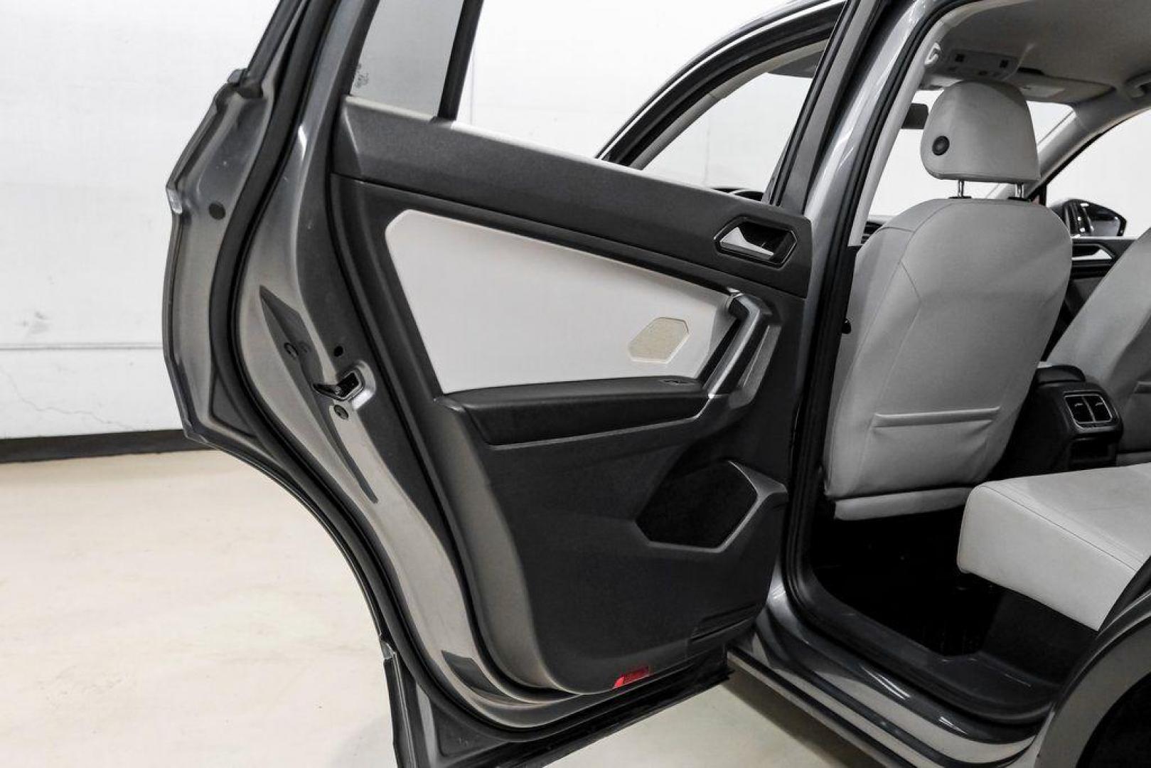 2018 Platinum Gray Metallic /White Volkswagen Tiguan 2.0T SEL (3VV3B7AX4JM) with an 2.0L TSI DOHC engine, Automatic transmission, located at 15300 Midway Rd., Addison, TX, 75001, (972) 702-0011, 32.958321, -96.838074 - Photo#46