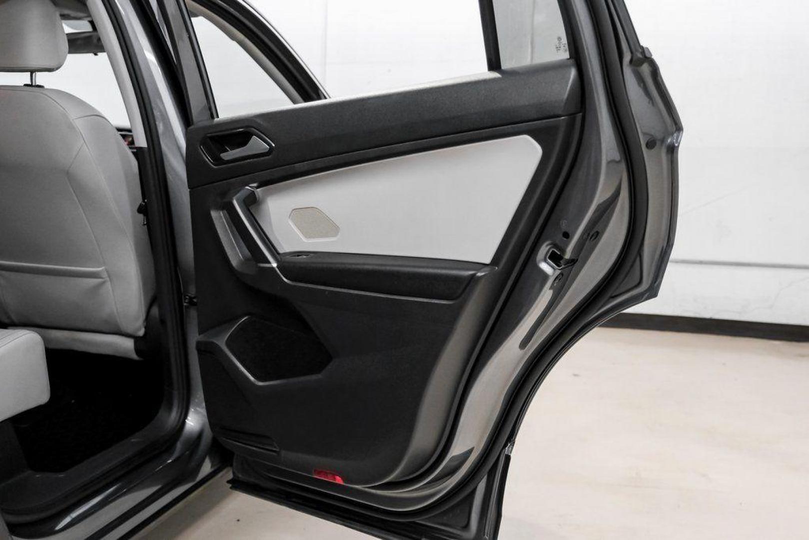 2018 Platinum Gray Metallic /White Volkswagen Tiguan 2.0T SEL (3VV3B7AX4JM) with an 2.0L TSI DOHC engine, Automatic transmission, located at 15300 Midway Rd., Addison, TX, 75001, (972) 702-0011, 32.958321, -96.838074 - Photo#47