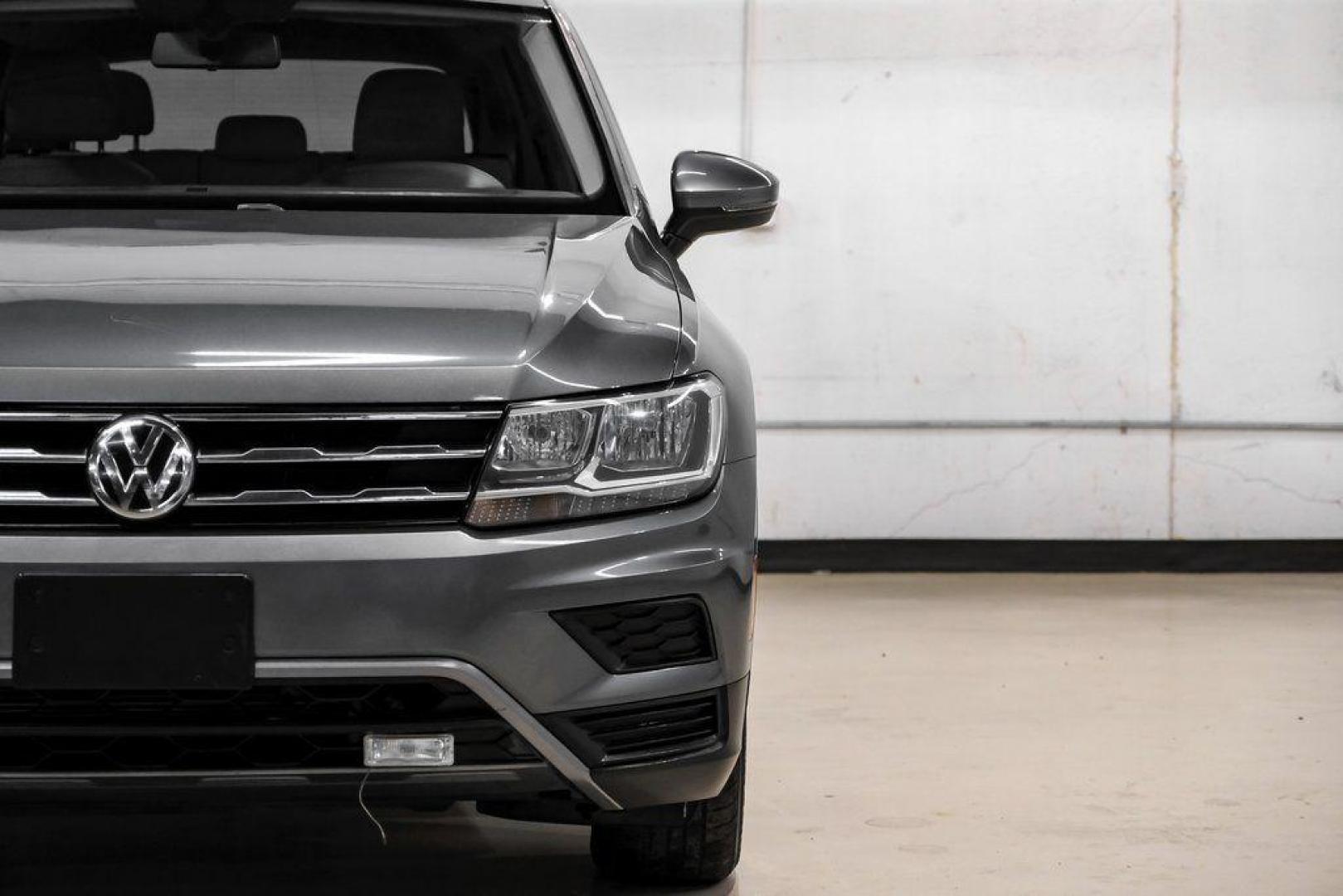 2018 Platinum Gray Metallic /White Volkswagen Tiguan 2.0T SEL (3VV3B7AX4JM) with an 2.0L TSI DOHC engine, Automatic transmission, located at 15300 Midway Rd., Addison, TX, 75001, (972) 702-0011, 32.958321, -96.838074 - Photo#48