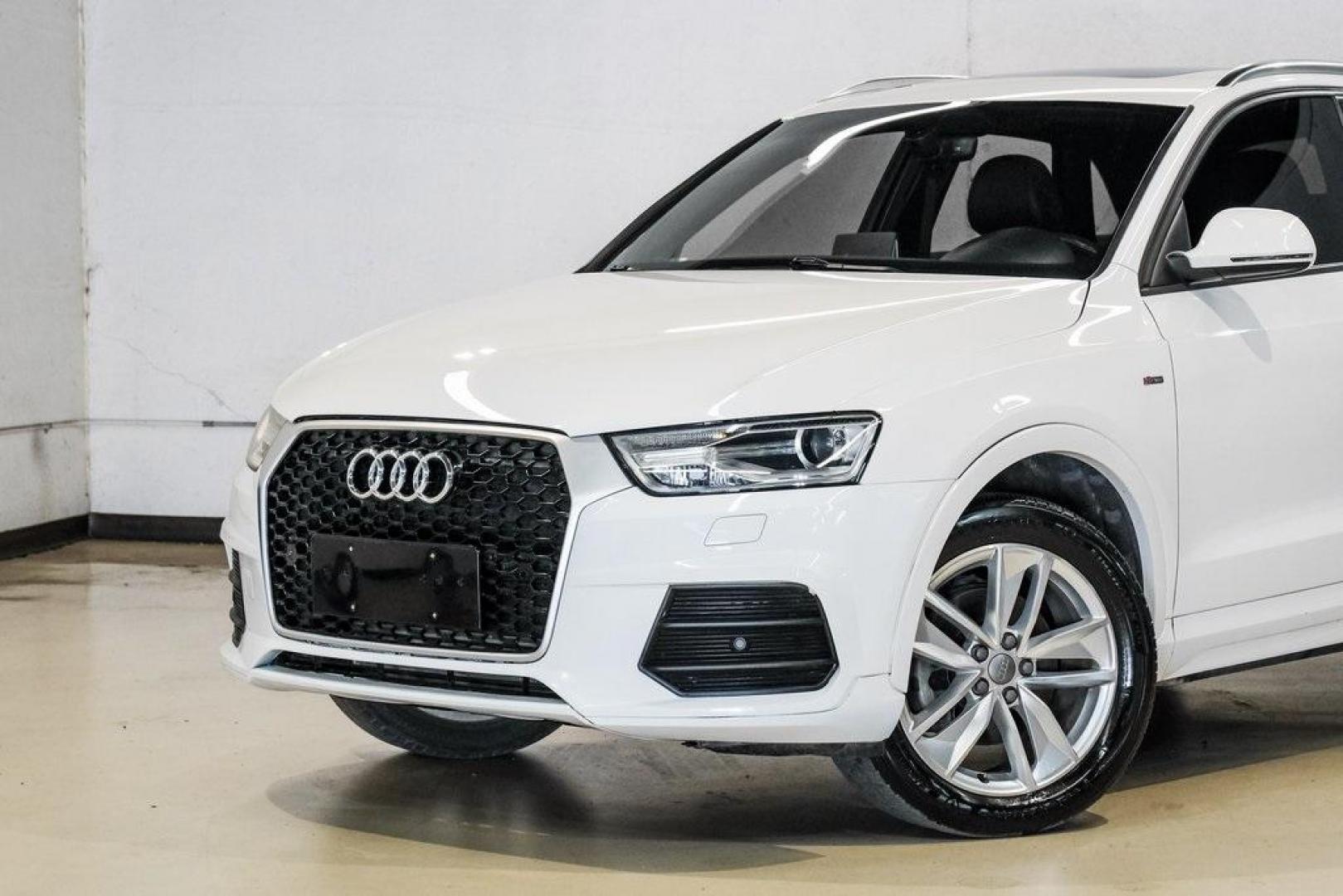 2018 White /Black Audi Q3 2.0T Premium (WA1BCCFS0JR) with an 2.0L 4-Cylinder TFSI engine, Automatic transmission, located at 15300 Midway Rd., Addison, TX, 75001, (972) 702-0011, 32.958321, -96.838074 - Photo#5