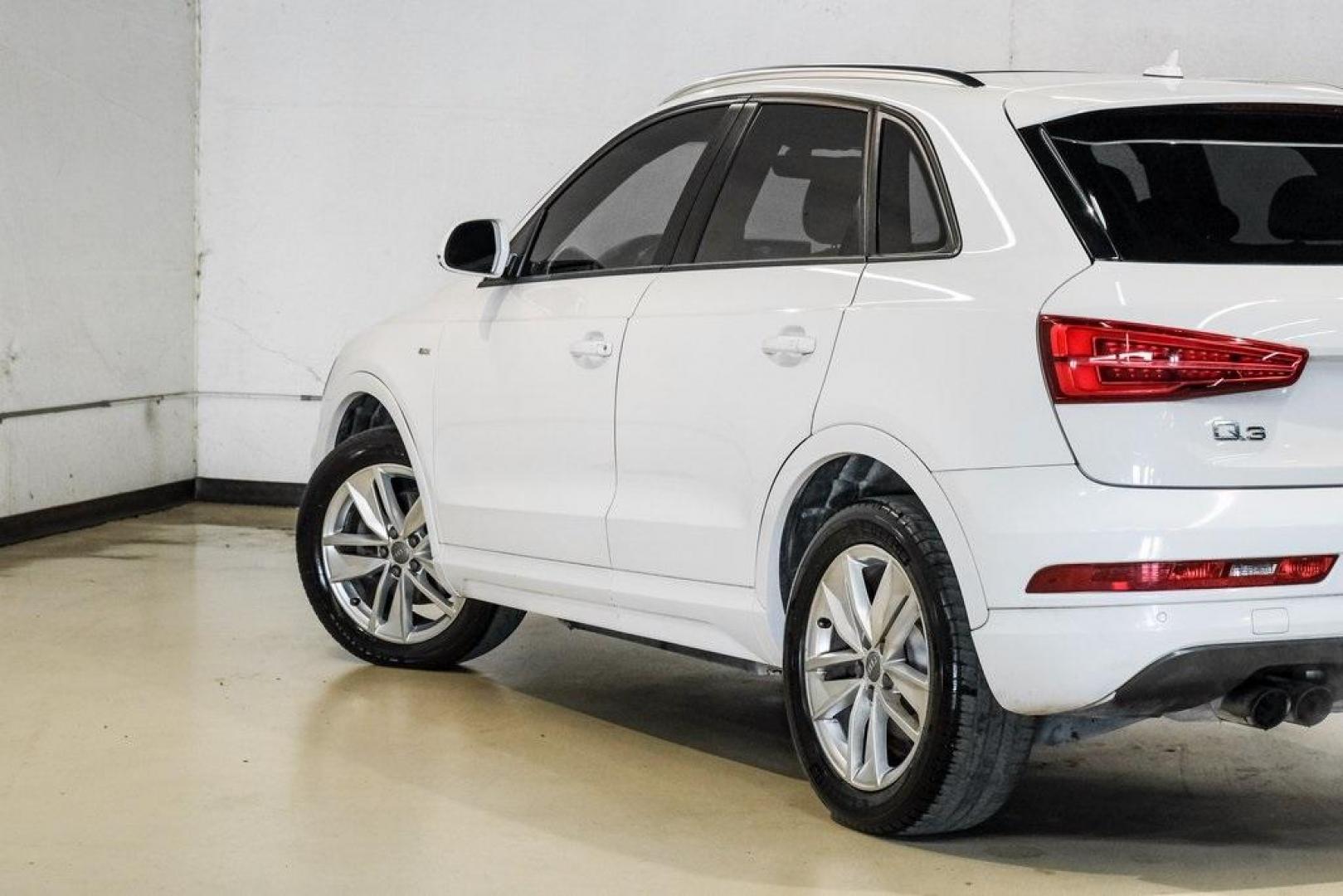 2018 White /Black Audi Q3 2.0T Premium (WA1BCCFS0JR) with an 2.0L 4-Cylinder TFSI engine, Automatic transmission, located at 15300 Midway Rd., Addison, TX, 75001, (972) 702-0011, 32.958321, -96.838074 - Photo#13