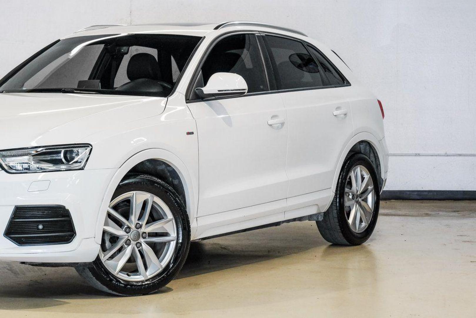 2018 White /Black Audi Q3 2.0T Premium (WA1BCCFS0JR) with an 2.0L 4-Cylinder TFSI engine, Automatic transmission, located at 15300 Midway Rd., Addison, TX, 75001, (972) 702-0011, 32.958321, -96.838074 - Photo#6