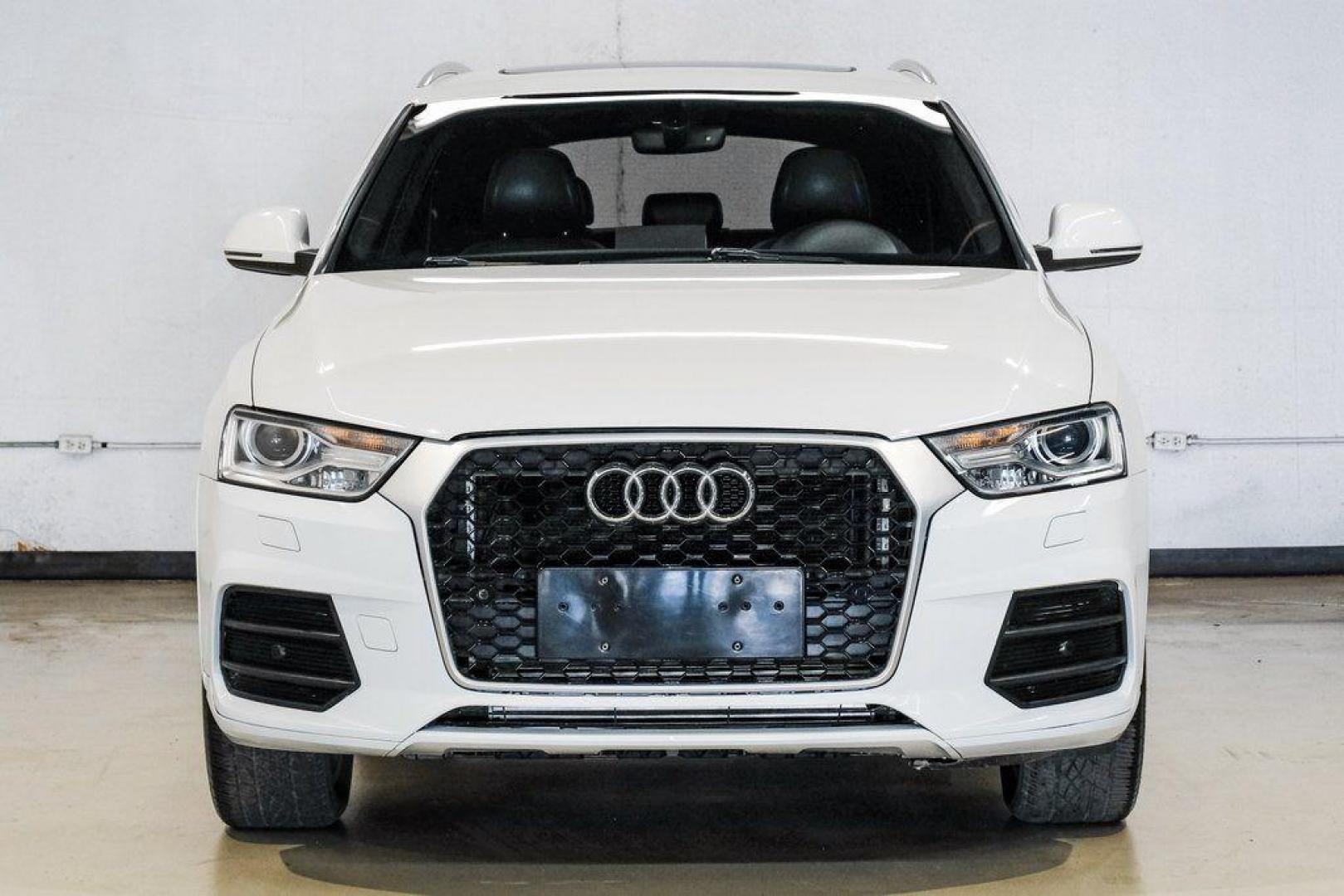 2018 White /Black Audi Q3 2.0T Premium (WA1BCCFS0JR) with an 2.0L 4-Cylinder TFSI engine, Automatic transmission, located at 15300 Midway Rd., Addison, TX, 75001, (972) 702-0011, 32.958321, -96.838074 - Photo#7