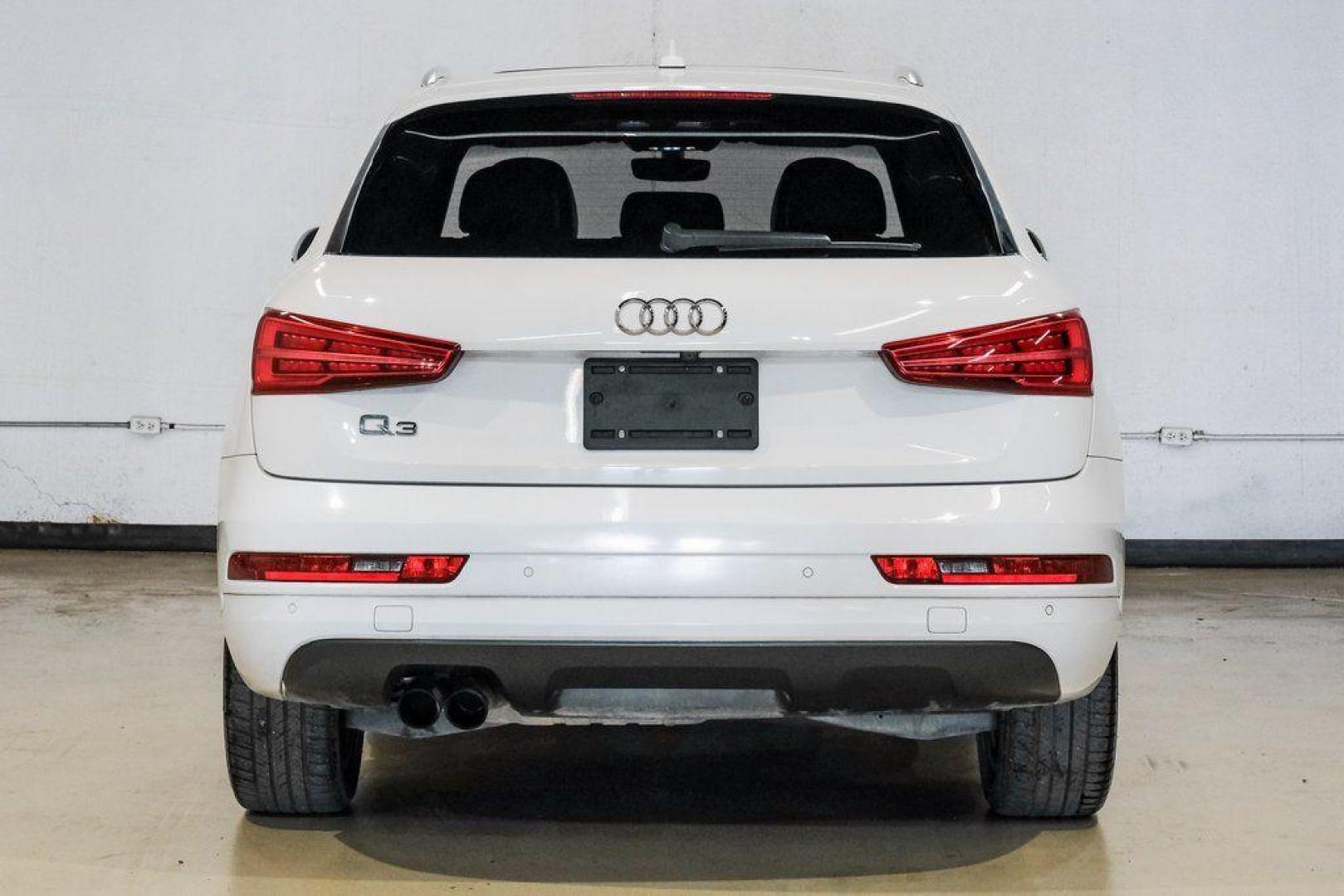 2018 White /Black Audi Q3 2.0T Premium (WA1BCCFS0JR) with an 2.0L 4-Cylinder TFSI engine, Automatic transmission, located at 15300 Midway Rd., Addison, TX, 75001, (972) 702-0011, 32.958321, -96.838074 - Photo#11