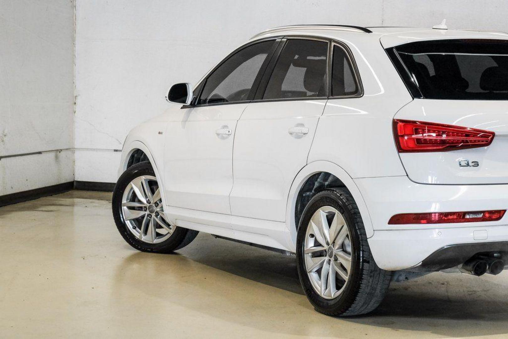 2018 White /Black Audi Q3 2.0T Premium (WA1BCCFS0JR) with an 2.0L 4-Cylinder TFSI engine, Automatic transmission, located at 15300 Midway Rd., Addison, TX, 75001, (972) 702-0011, 32.958321, -96.838074 - Photo#13