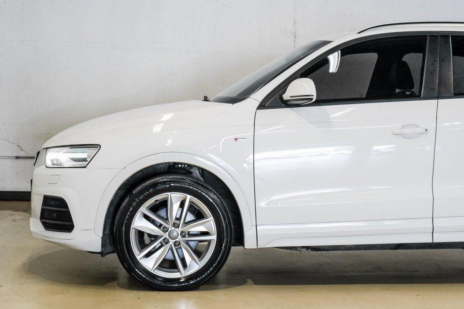 2018 White /Black Audi Q3 2.0T Premium (WA1BCCFS0JR) with an 2.0L 4-Cylinder TFSI engine, Automatic transmission, located at 15300 Midway Rd., Addison, TX, 75001, (972) 702-0011, 32.958321, -96.838074 - Photo#16