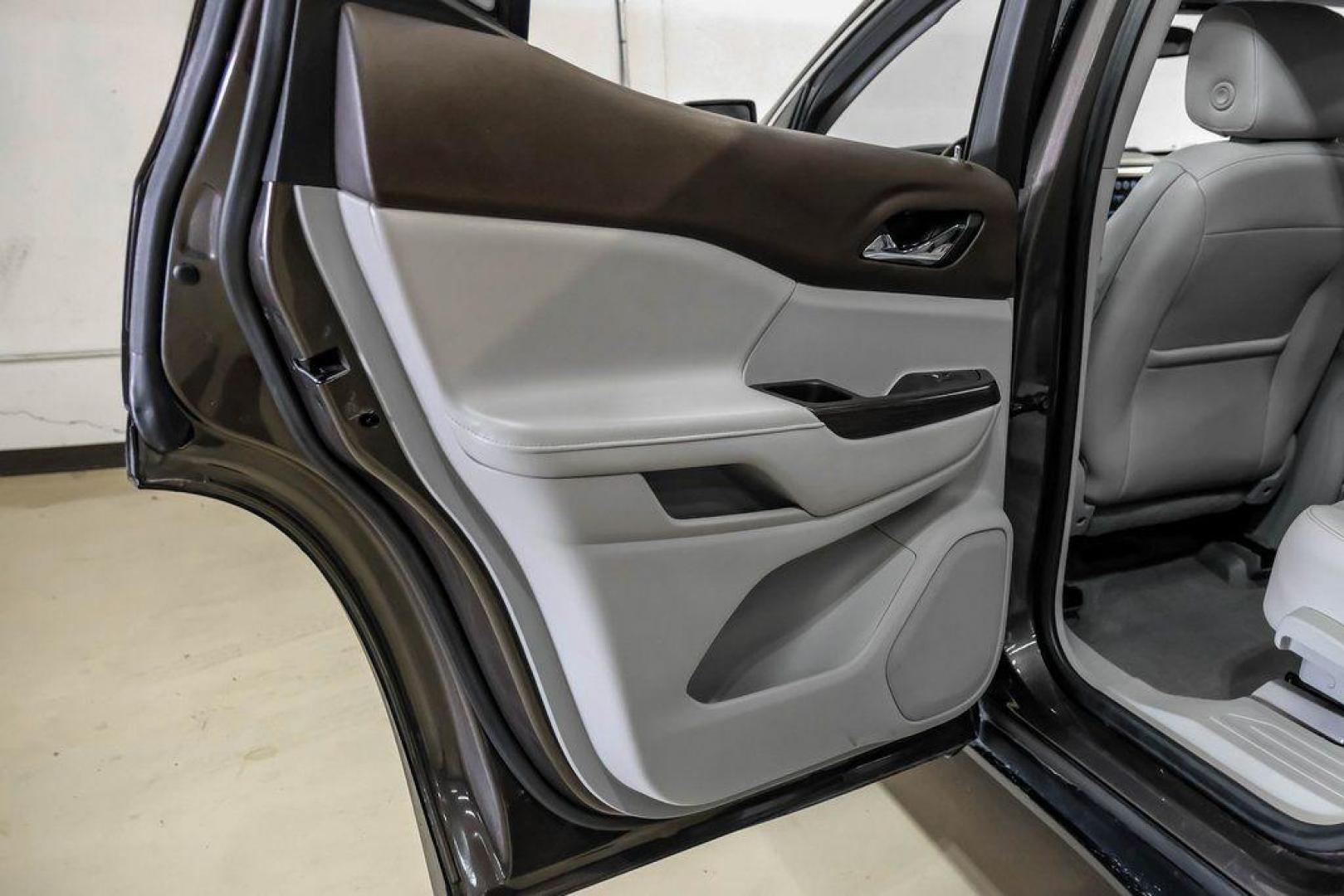 2019 Smokey Quartz Metallic /Cocoa/ Light Ash Gray GMC Acadia SLT-1 (1GKKNMLS4KZ) with an 3.6L V6 SIDI engine, Automatic transmission, located at 15300 Midway Rd., Addison, TX, 75001, (972) 702-0011, 32.958321, -96.838074 - Photo#49