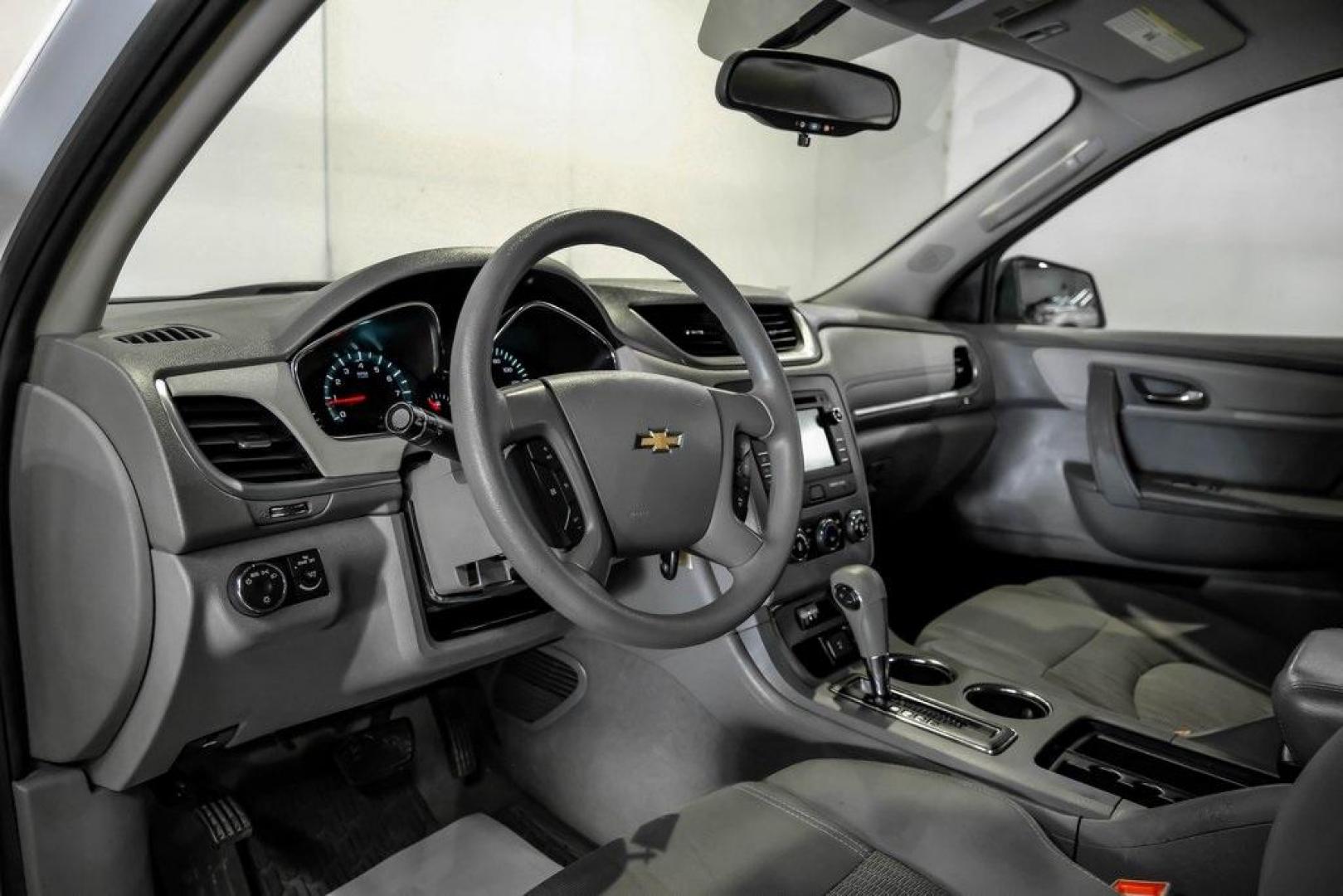 2017 Summit White /Dark Titanium/Light Titanium Chevrolet Traverse LS (1GNKRFKD9HJ) with an 3.6L V6 SIDI engine, Automatic transmission, located at 15300 Midway Rd., Addison, TX, 75001, (972) 702-0011, 32.958321, -96.838074 - Photo#2