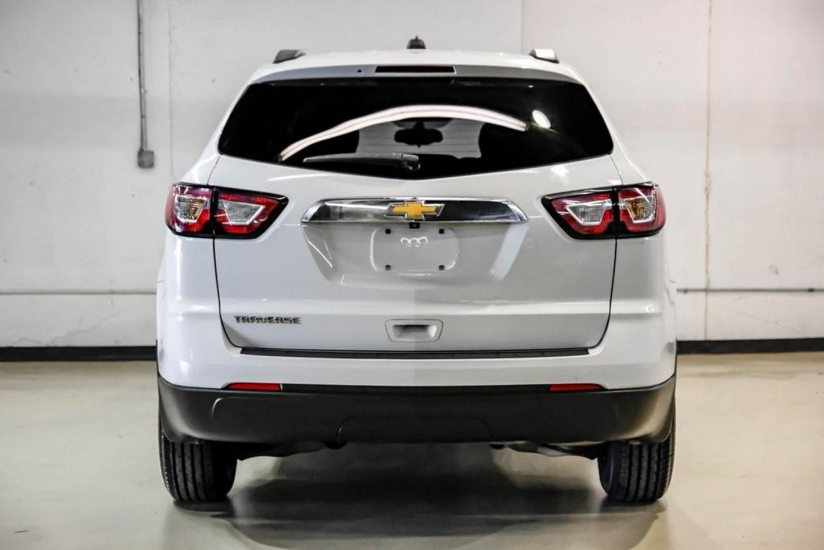 2017 Summit White /Dark Titanium/Light Titanium Chevrolet Traverse LS (1GNKRFKD9HJ) with an 3.6L V6 SIDI engine, Automatic transmission, located at 15300 Midway Rd., Addison, TX, 75001, (972) 702-0011, 32.958321, -96.838074 - Photo#7