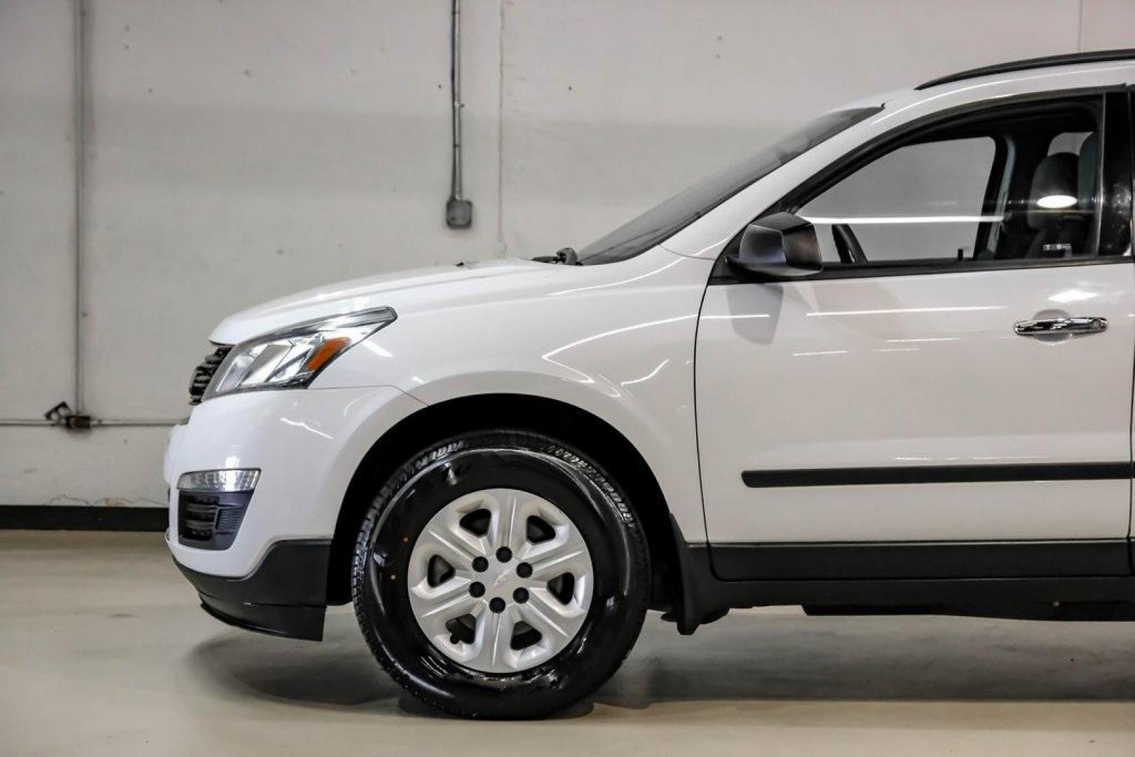 2017 Summit White /Dark Titanium/Light Titanium Chevrolet Traverse LS (1GNKRFKD9HJ) with an 3.6L V6 SIDI engine, Automatic transmission, located at 15300 Midway Rd., Addison, TX, 75001, (972) 702-0011, 32.958321, -96.838074 - Photo#10