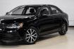 2017 Black /Titan Black Volkswagen Jetta 1.4T SE (3VWDB7AJ9HM) with an 1.4L TSI engine, Automatic transmission, located at 15300 Midway Rd., Addison, TX, 75001, (972) 702-0011, 32.958321, -96.838074 - Photo#6