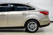 2018 White Gold /Medium Light Stone Ford Focus SE (1FADP3F22JL) with an 2.0L I4 DGI Ti-VCT engine, Automatic transmission, located at 15300 Midway Rd., Addison, TX, 75001, (972) 702-0011, 32.958321, -96.838074 - Photo#12