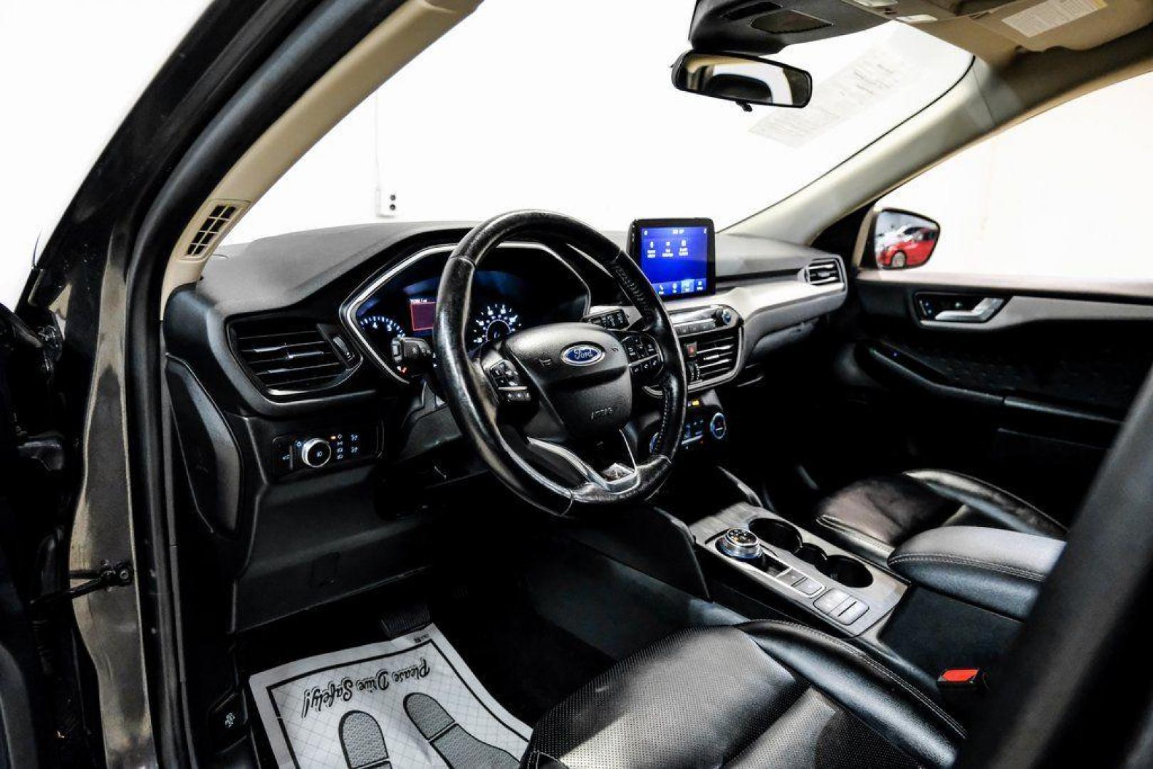 2020 Magnetic /Ebony Ford Escape SEL (1FMCU0H62LU) with an 1.5L EcoBoost engine, Automatic transmission, located at 15300 Midway Rd., Addison, TX, 75001, (972) 702-0011, 32.958321, -96.838074 - Photo#2