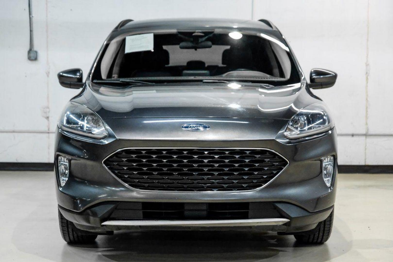 2020 Magnetic /Ebony Ford Escape SEL (1FMCU0H62LU) with an 1.5L EcoBoost engine, Automatic transmission, located at 15300 Midway Rd., Addison, TX, 75001, (972) 702-0011, 32.958321, -96.838074 - Photo#4