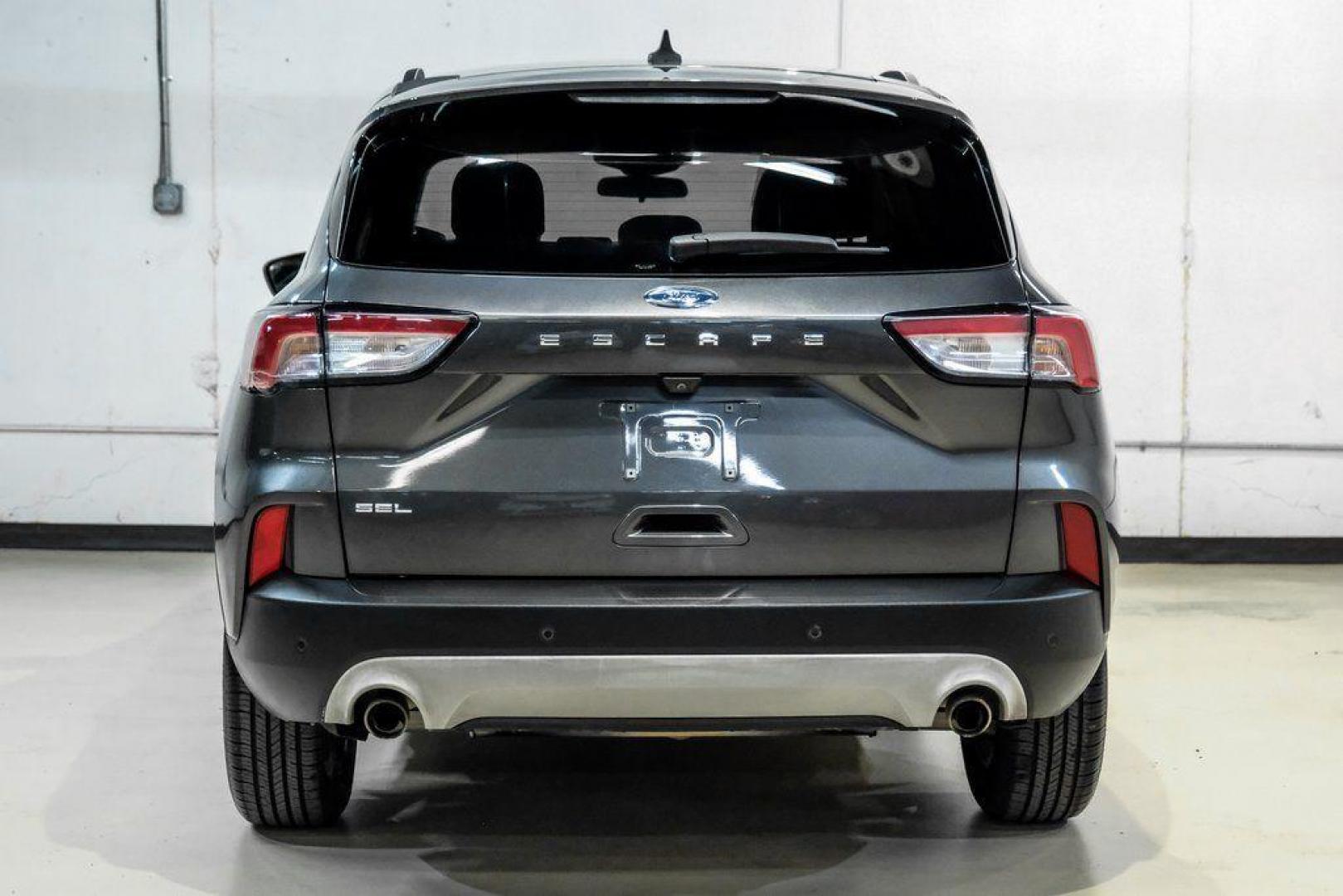 2020 Magnetic /Ebony Ford Escape SEL (1FMCU0H62LU) with an 1.5L EcoBoost engine, Automatic transmission, located at 15300 Midway Rd., Addison, TX, 75001, (972) 702-0011, 32.958321, -96.838074 - Photo#8